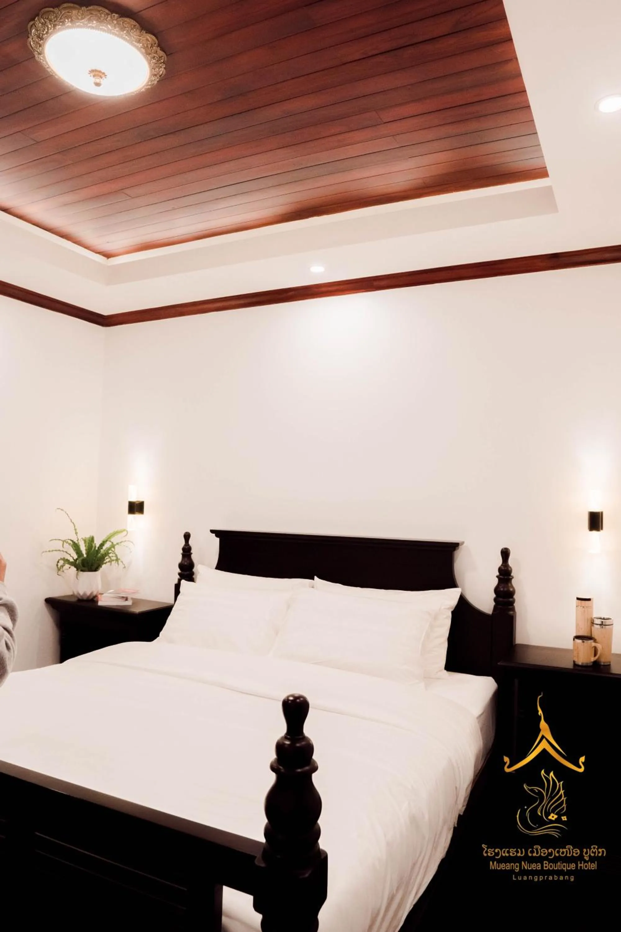 Bed in Mueang Nuea Boutique Hotel