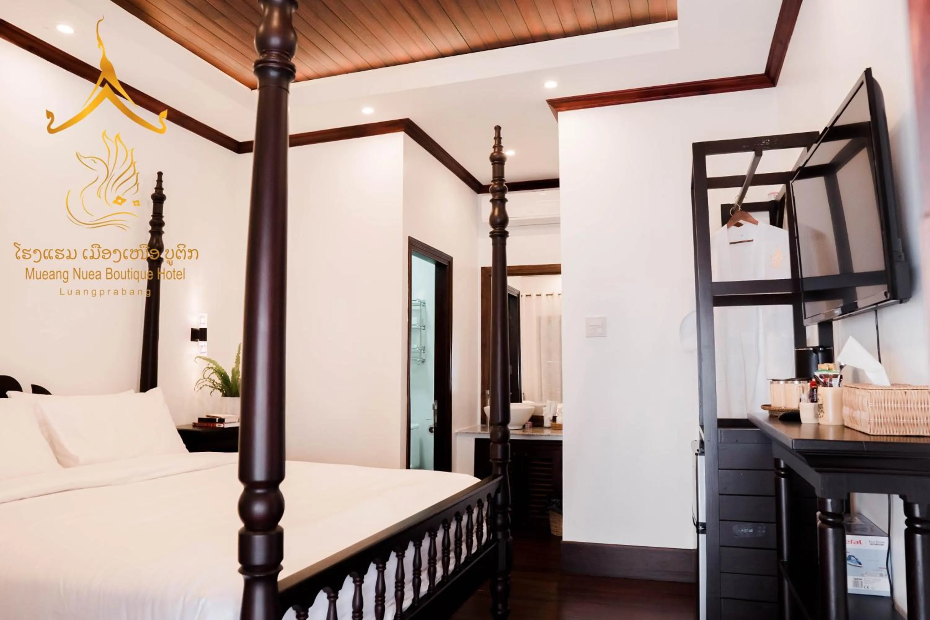 Bed in Mueang Nuea Boutique Hotel