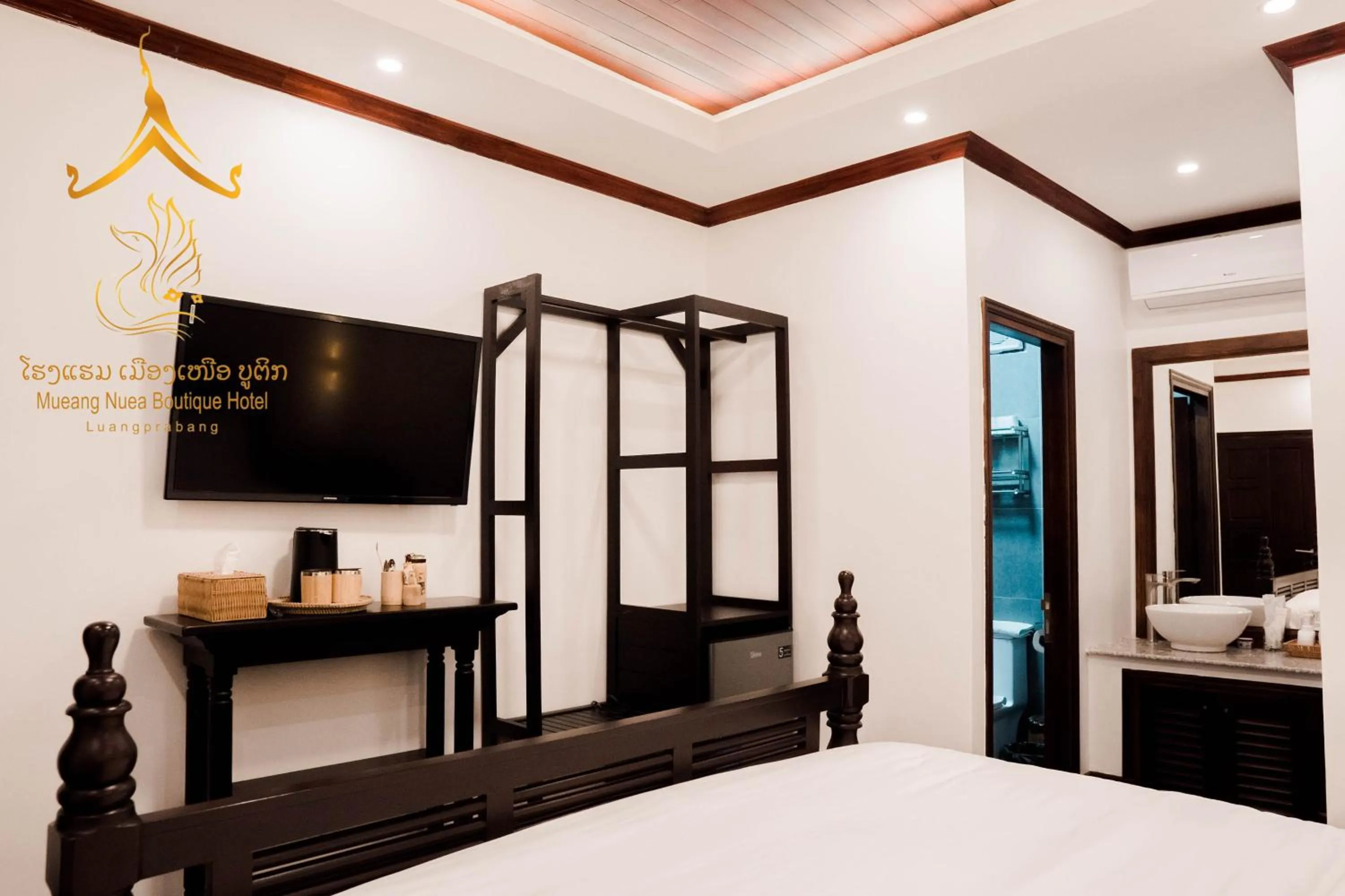TV and multimedia, Bed in Mueang Nuea Boutique Hotel