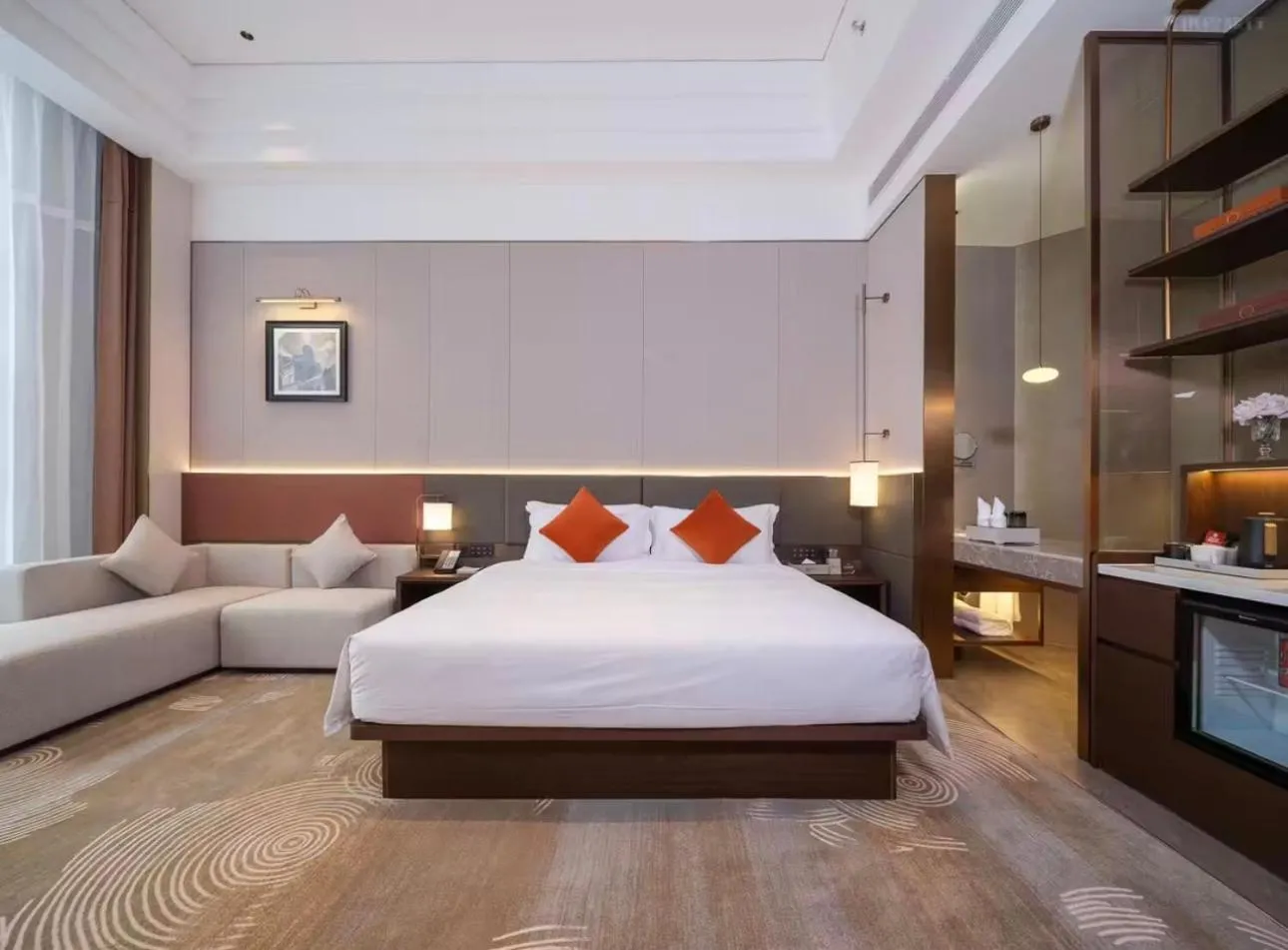 Bed in SINOKAI International Hotel