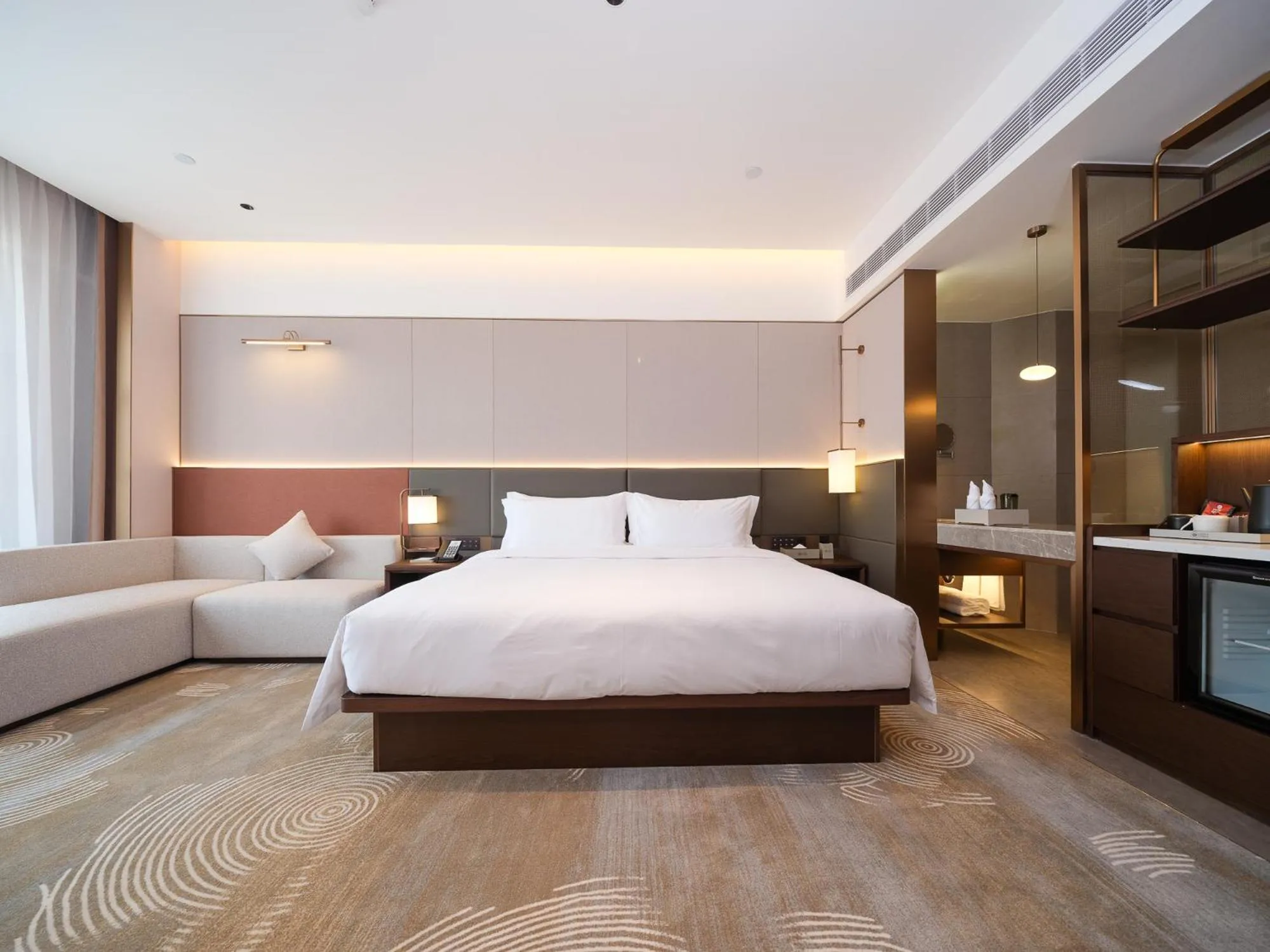 Living room, Bed in SINOKAI International Hotel