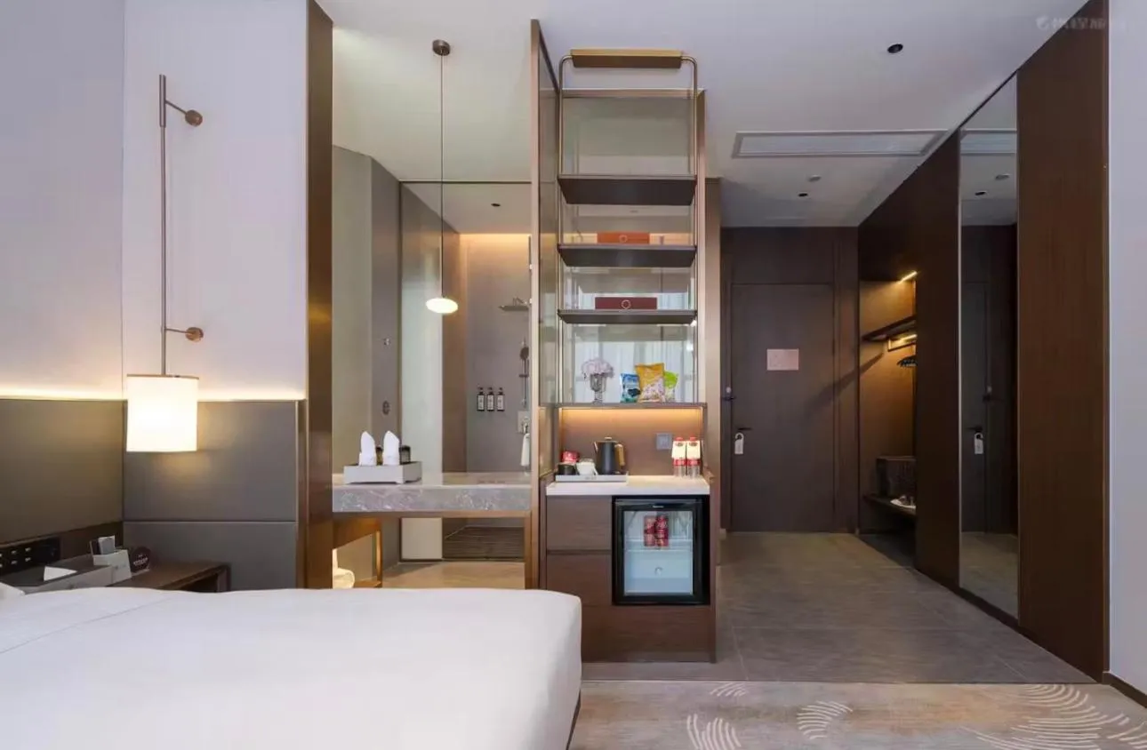 Bed in SINOKAI International Hotel