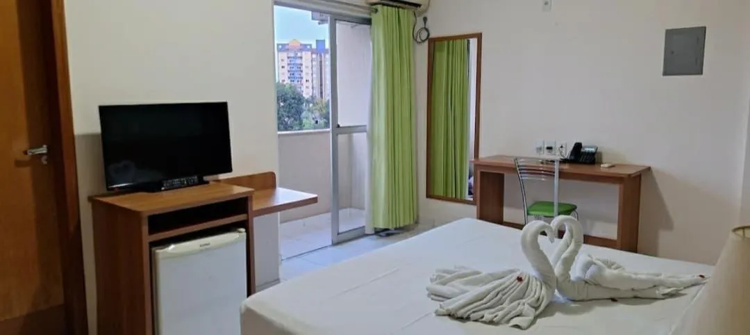 Bed in Golden Dolphin Grand Hotel