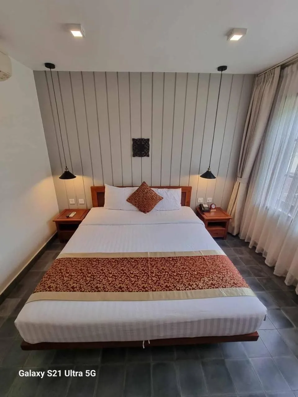 Bed in Day Sunrise Boutique Hotel