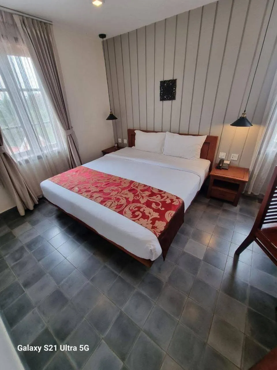 Bed in Day Sunrise Boutique Hotel