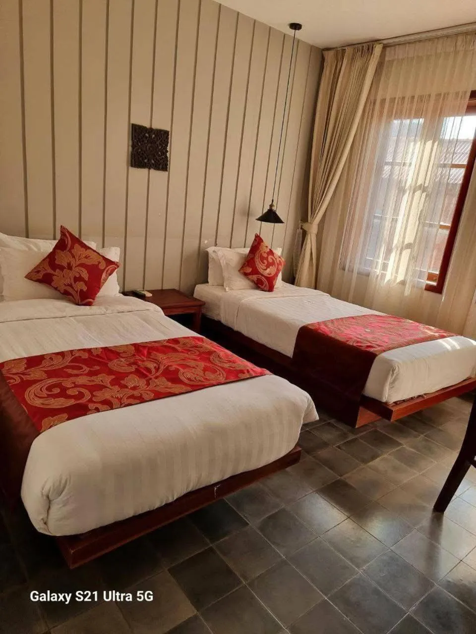 Bed in Day Sunrise Boutique Hotel