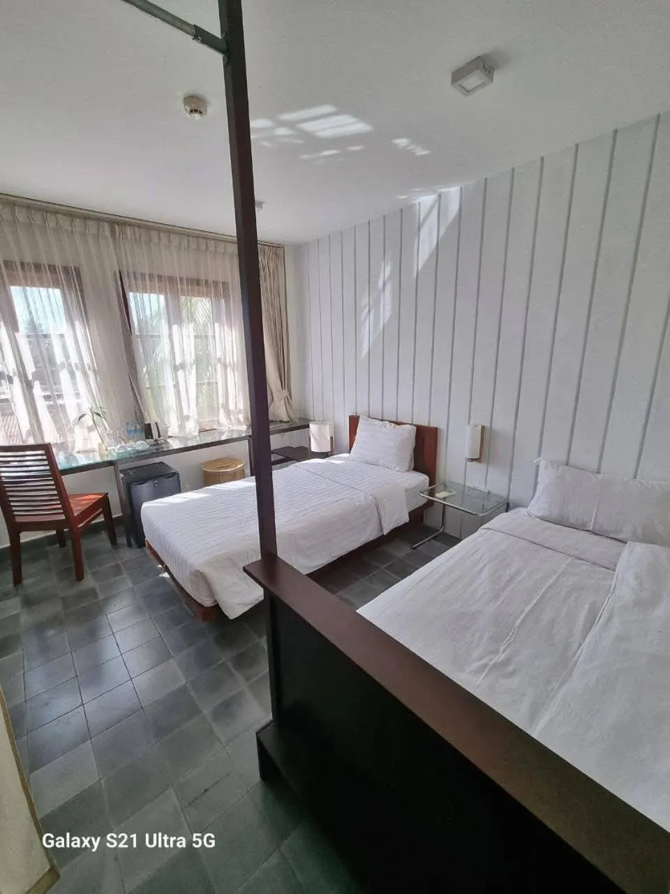 Bed in Day Sunrise Boutique Hotel