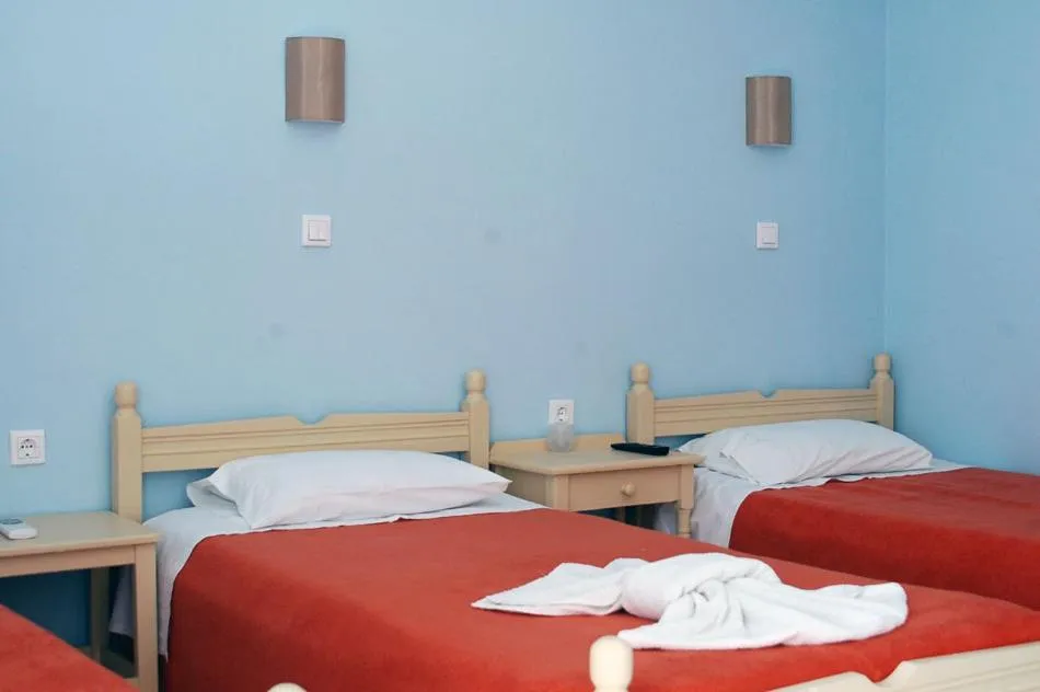 Bed in Hotel Paros