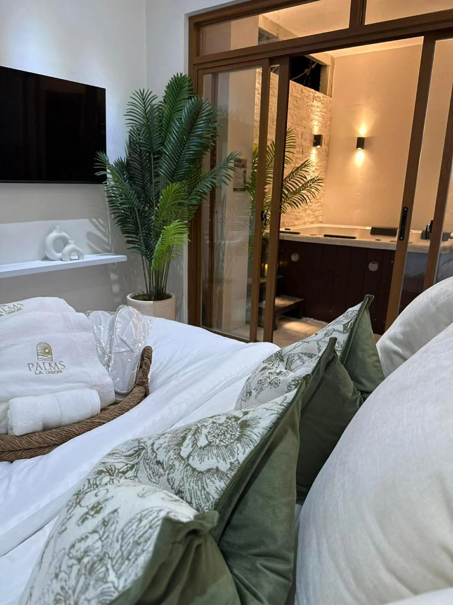 Bed in Palms La Union Beachfront Suites