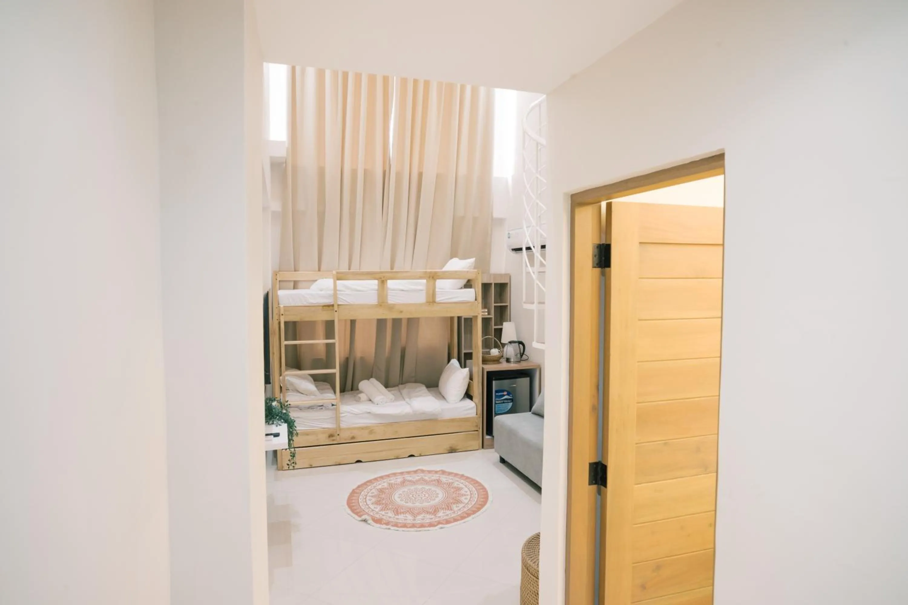 Bed in Palms La Union Beachfront Suites
