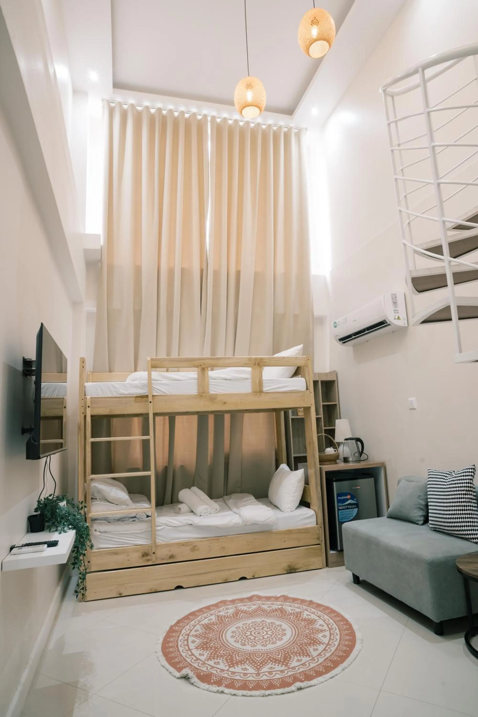 Bed in Palms La Union Beachfront Suites