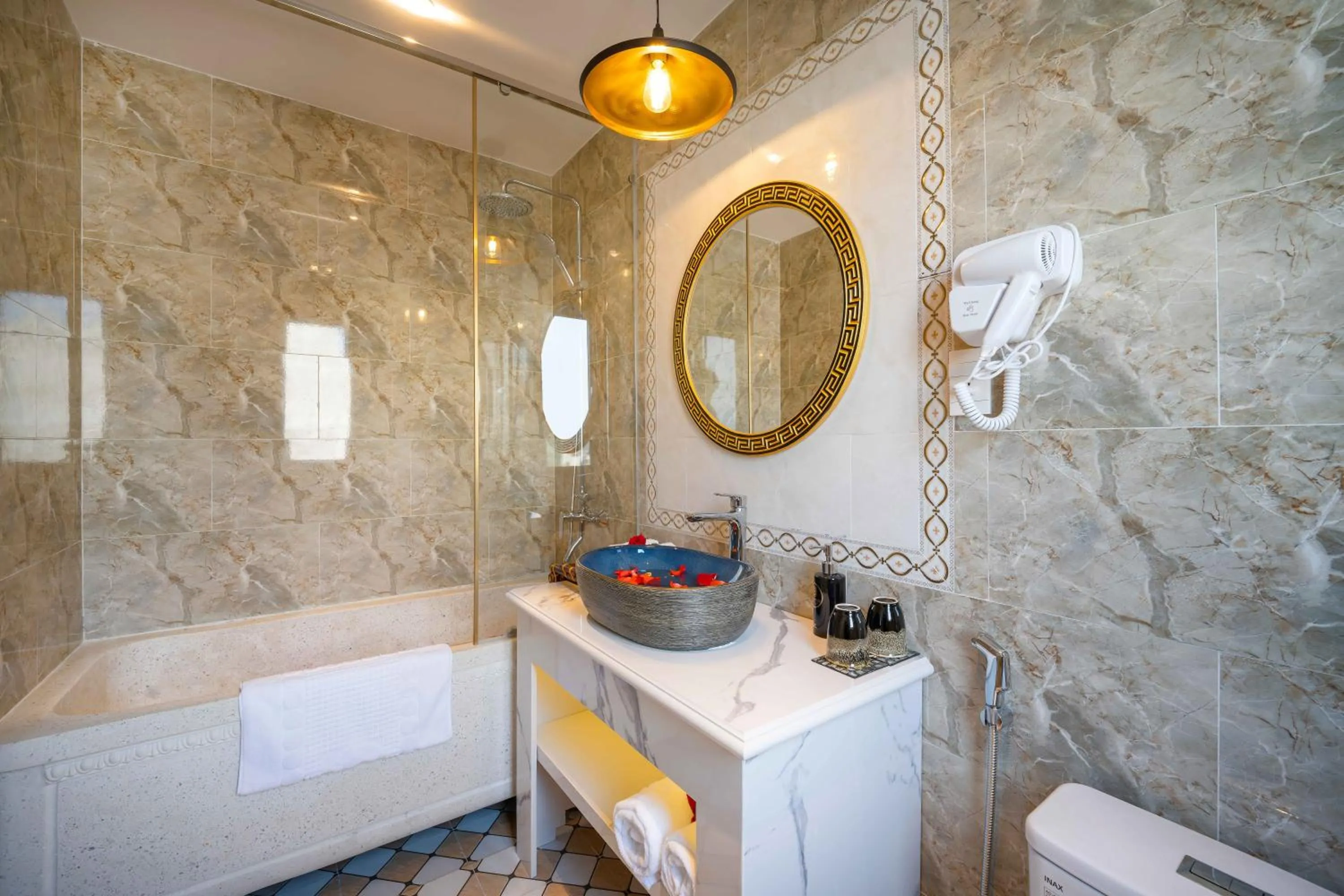 Shower in Soleil by Soluna - A Charming Touch of Hoi An Heritage - formerly Hoi An Babylon Luxury Hotel