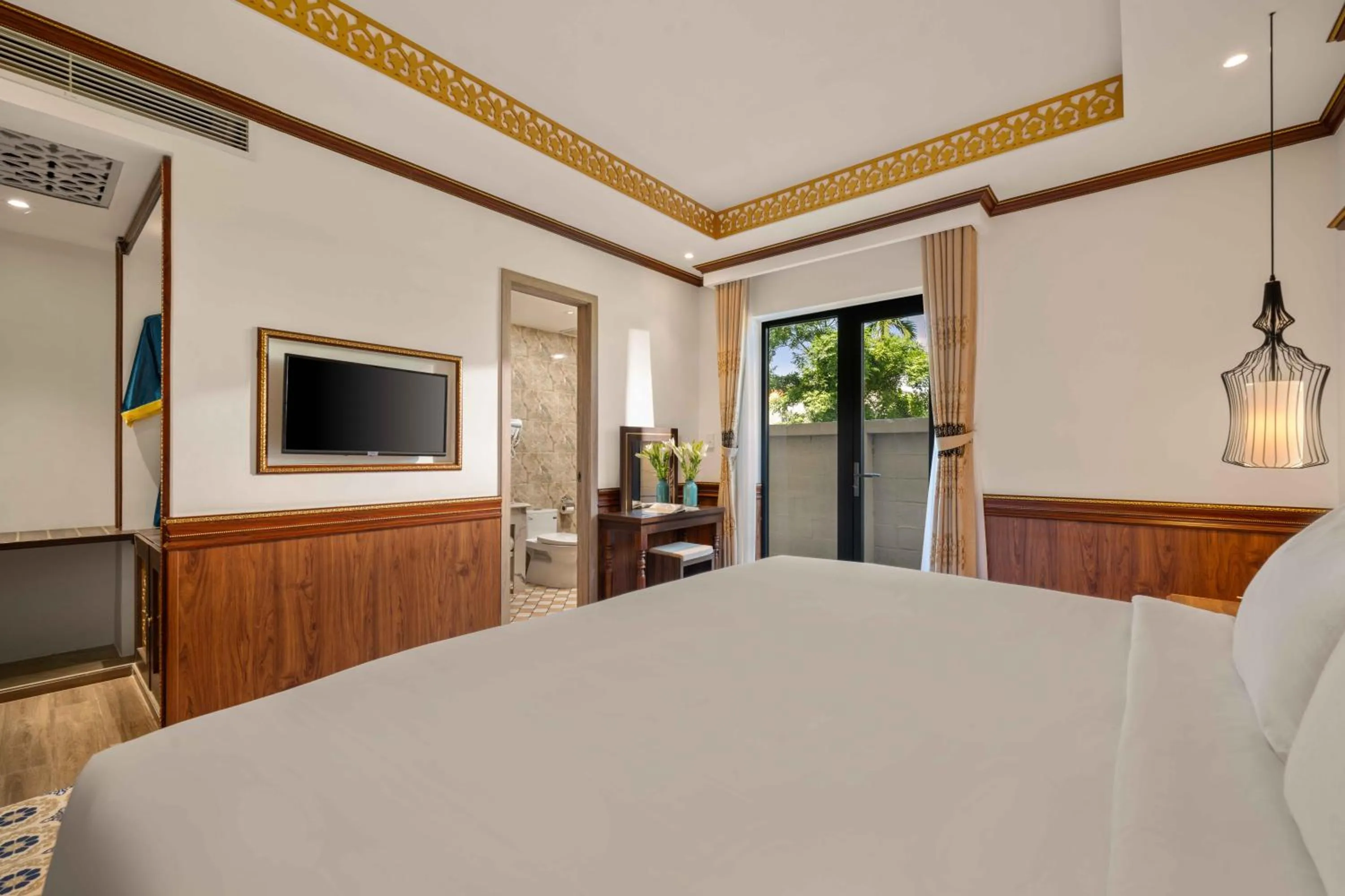 Bed in Soleil by Soluna - A Charming Touch of Hoi An Heritage - formerly Hoi An Babylon Luxury Hotel