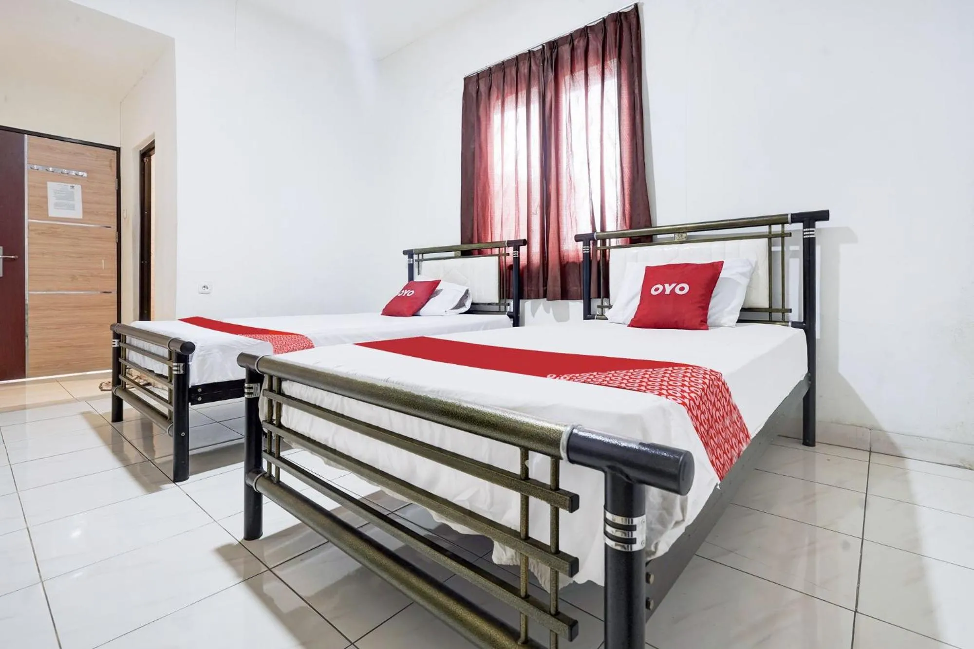 Bedroom, Bed in OYO 94774 Mulia House