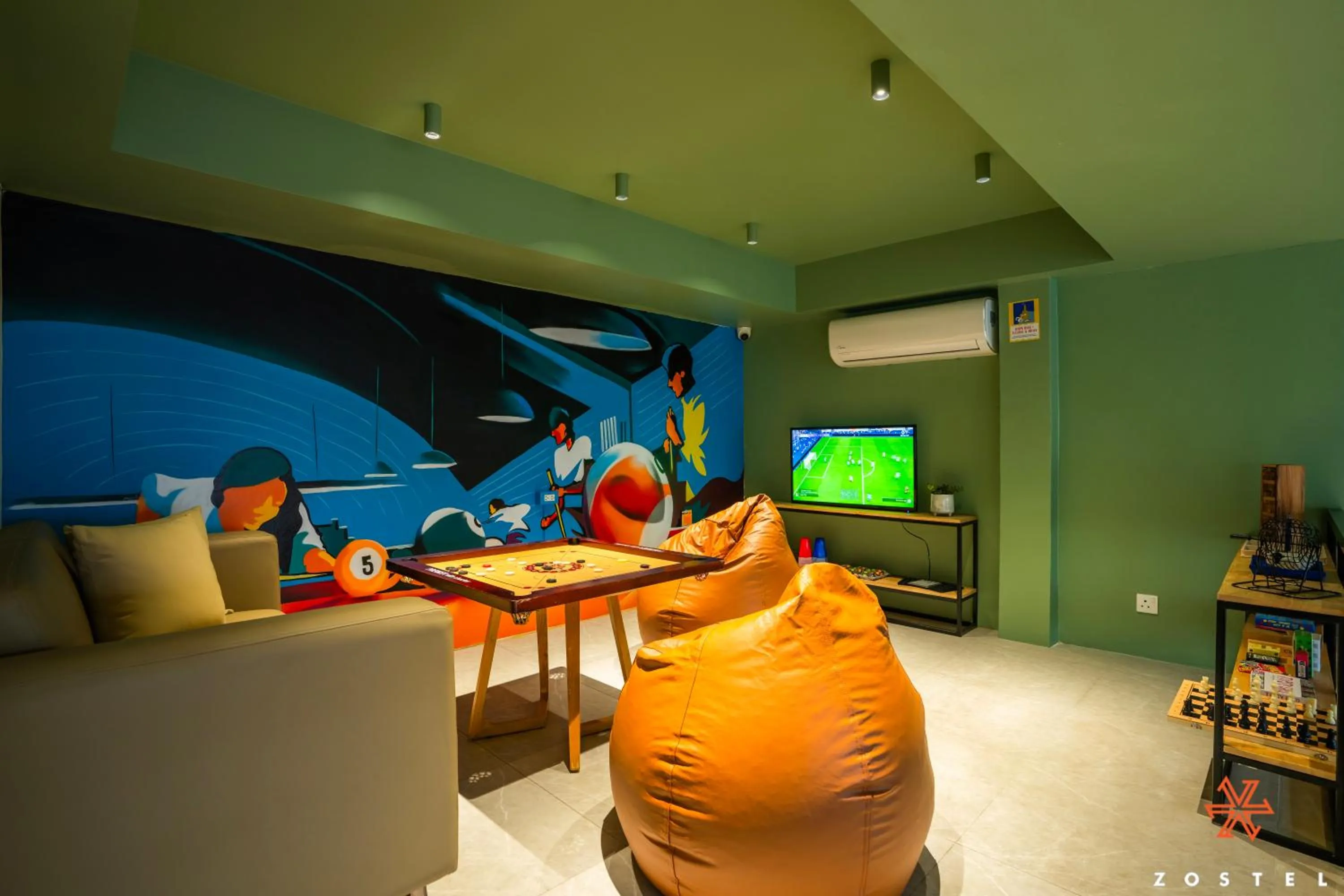 Communal lounge/ TV room in Zostel Phuket