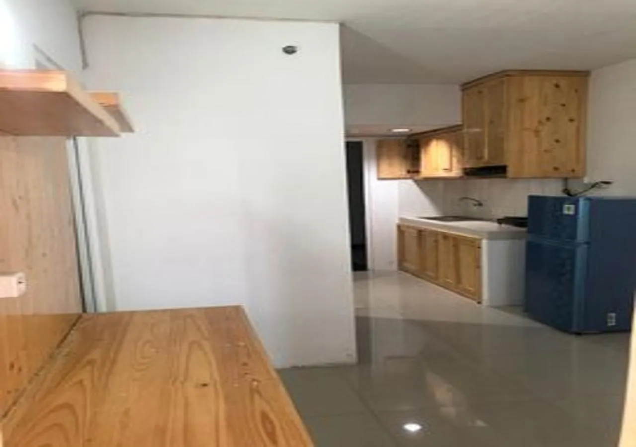 Kitchen or kitchenette in Laguna Room at Apartment Grand Sentraland Karawang