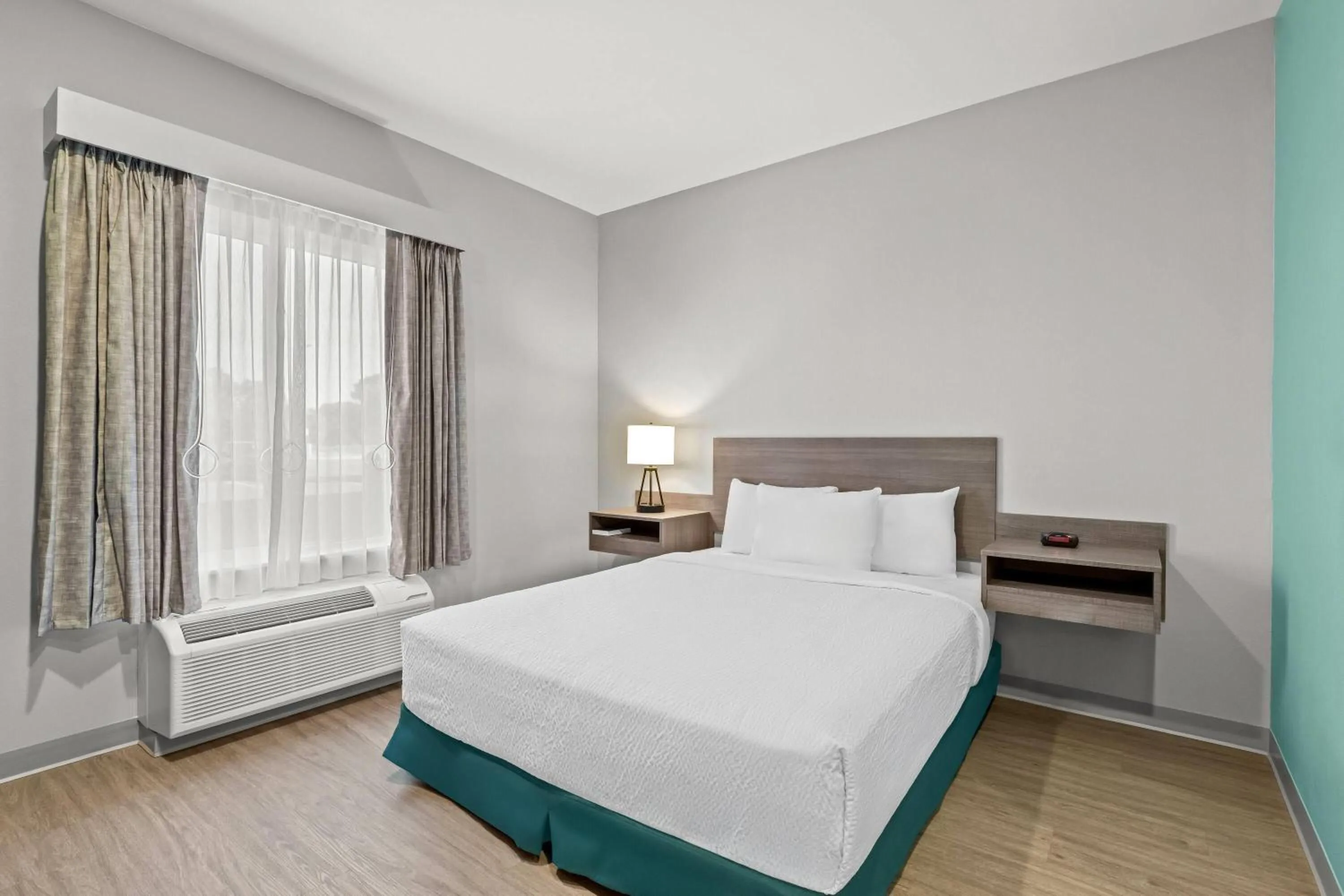 Bed in Echo Suites Extended Stay by Wyndham Atlanta-Conyers