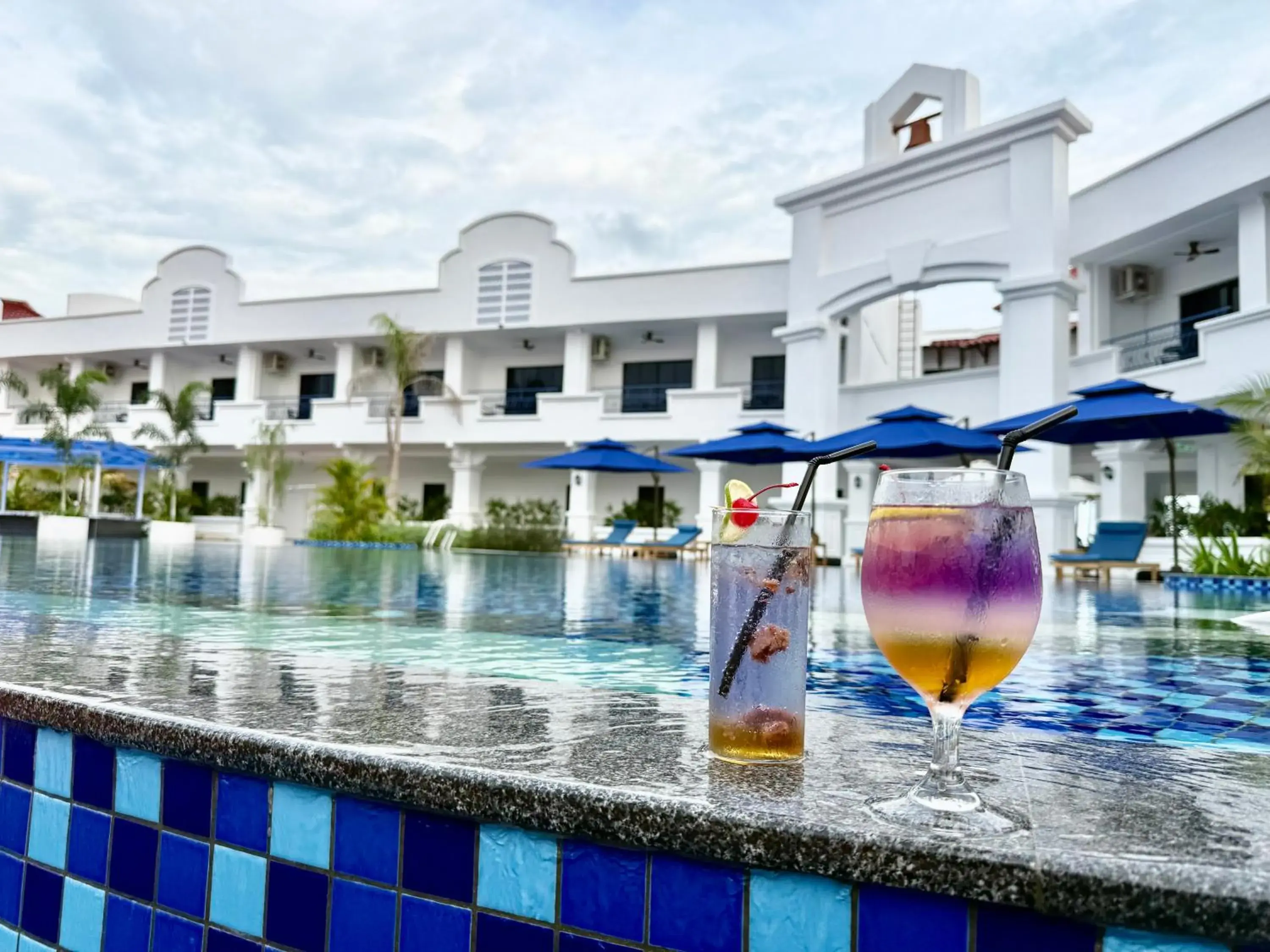 Pool view in The Lisbon Melaka, Trademark Collection by Wyndham Pool view in The Lisbon Melaka, Trademark Collection by Wyndham