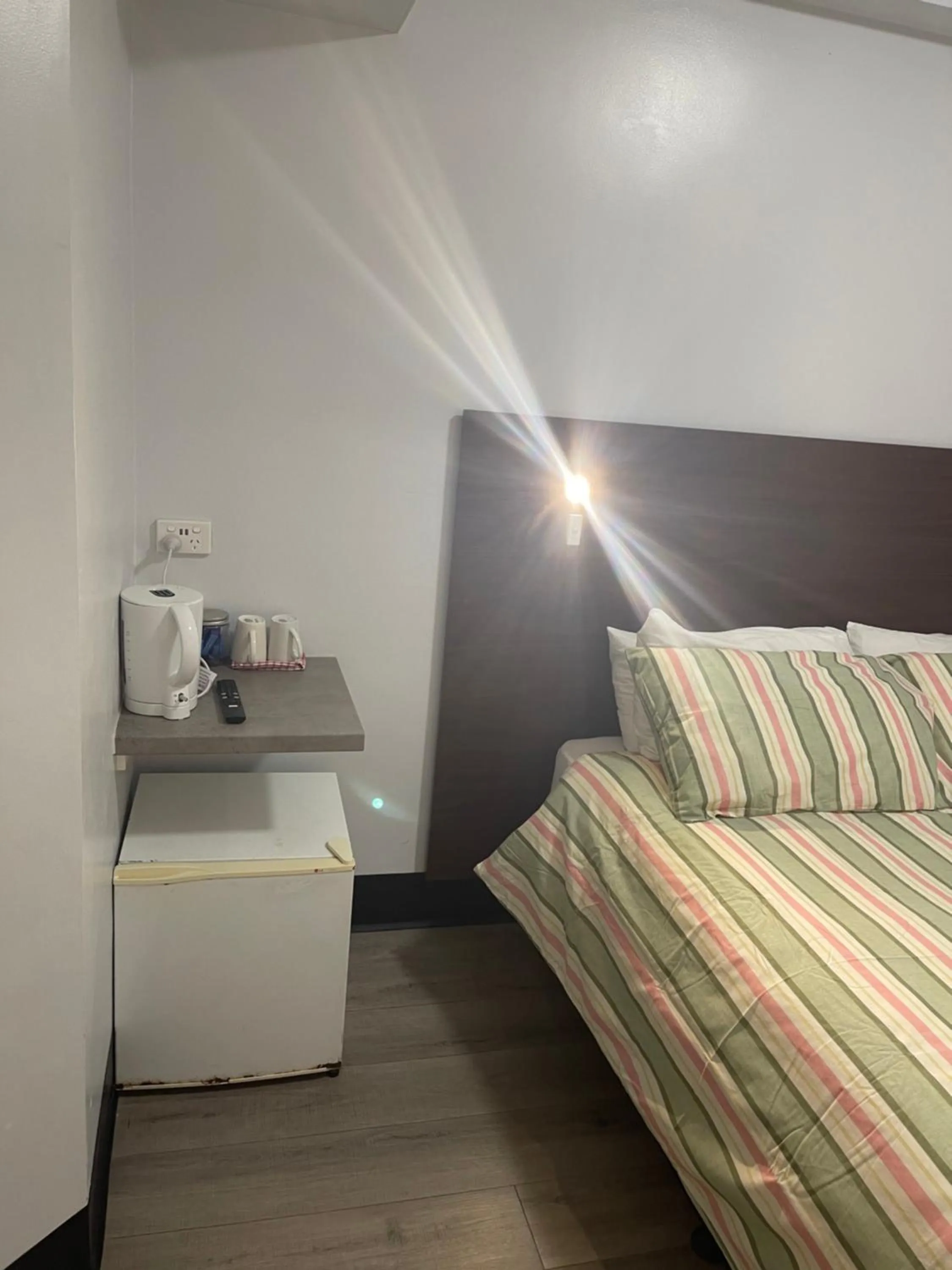 Bed in Value Inn Arafura Stairway