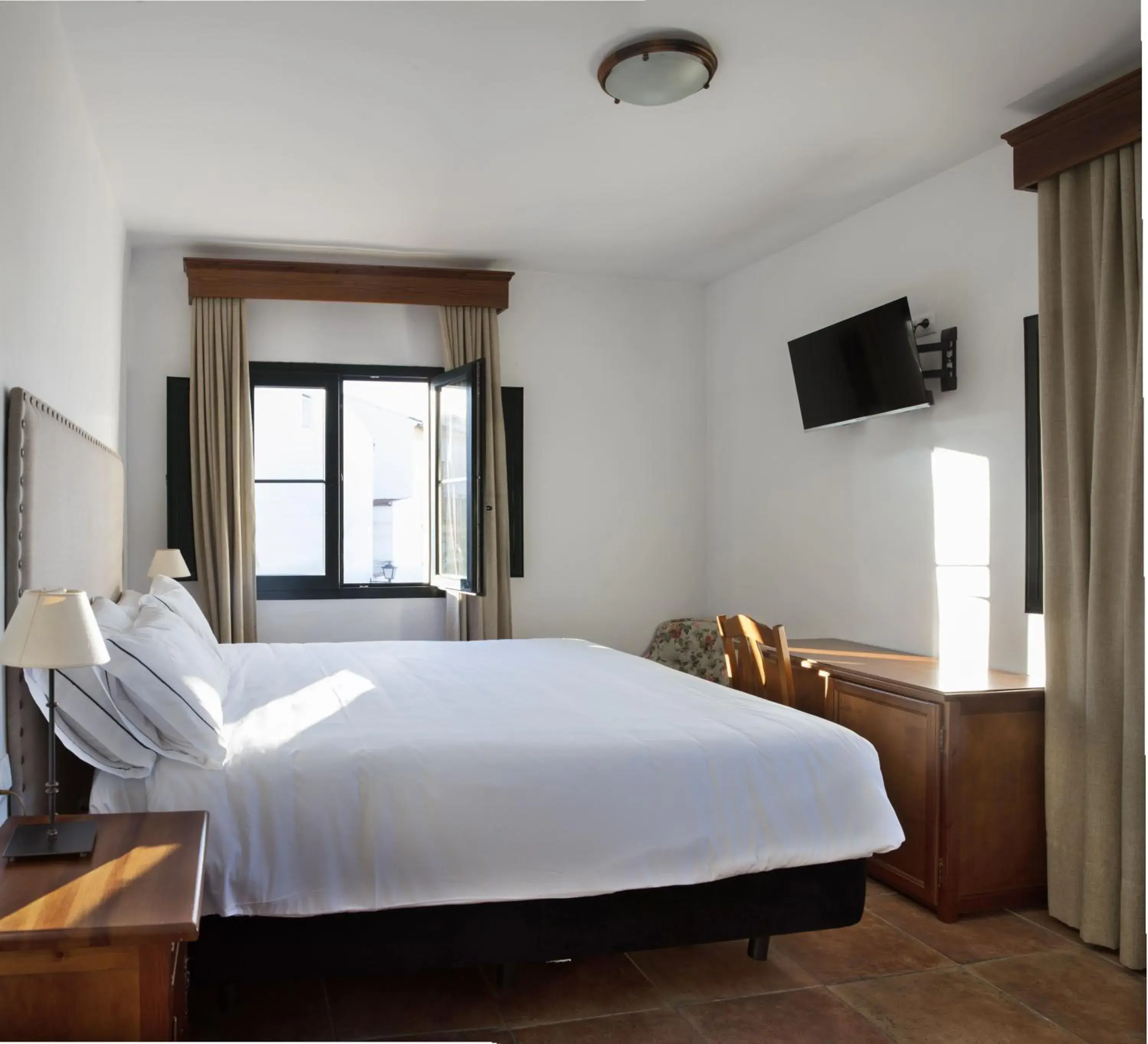 Photo of the whole room, Bed in Hotel Tugasa Sierra y Cal Photo of the whole room, Bed in Hotel Tugasa Sierra y Cal