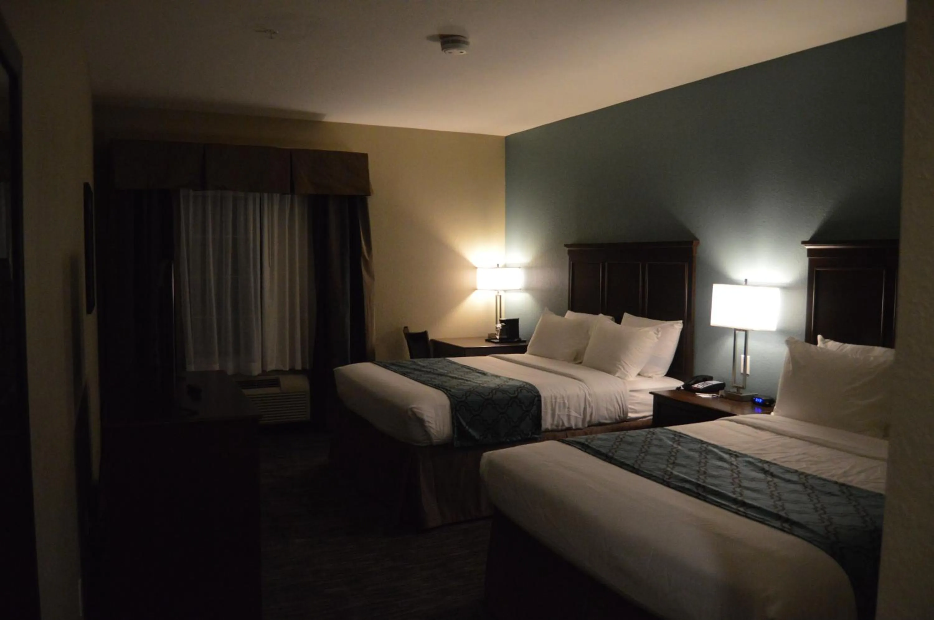 Bed in Heritage Place Hotel and Suites