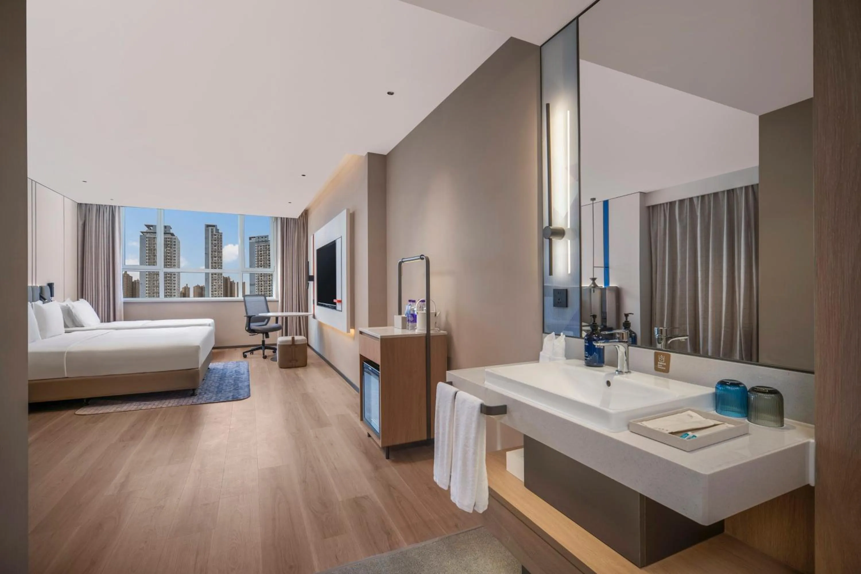 Photo of the whole room, Bed in Holiday Inn Express Qingdao Downtown by IHG