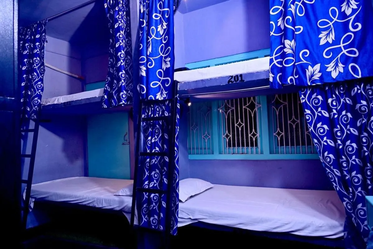 Photo of the whole room, Bed in Banaras Rest House