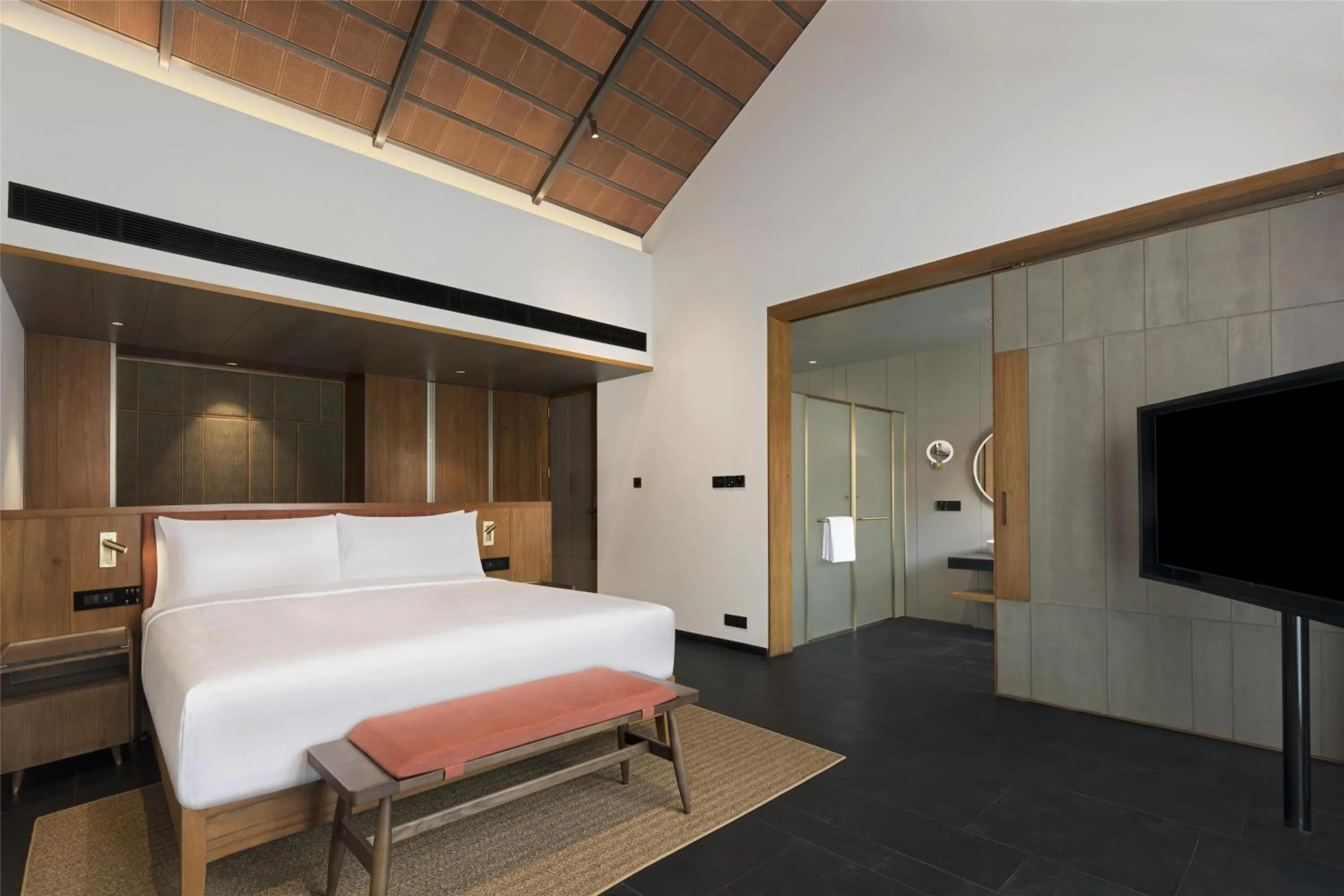 Bed in Hilton Hyderabad Genome Valley Resort & Spa