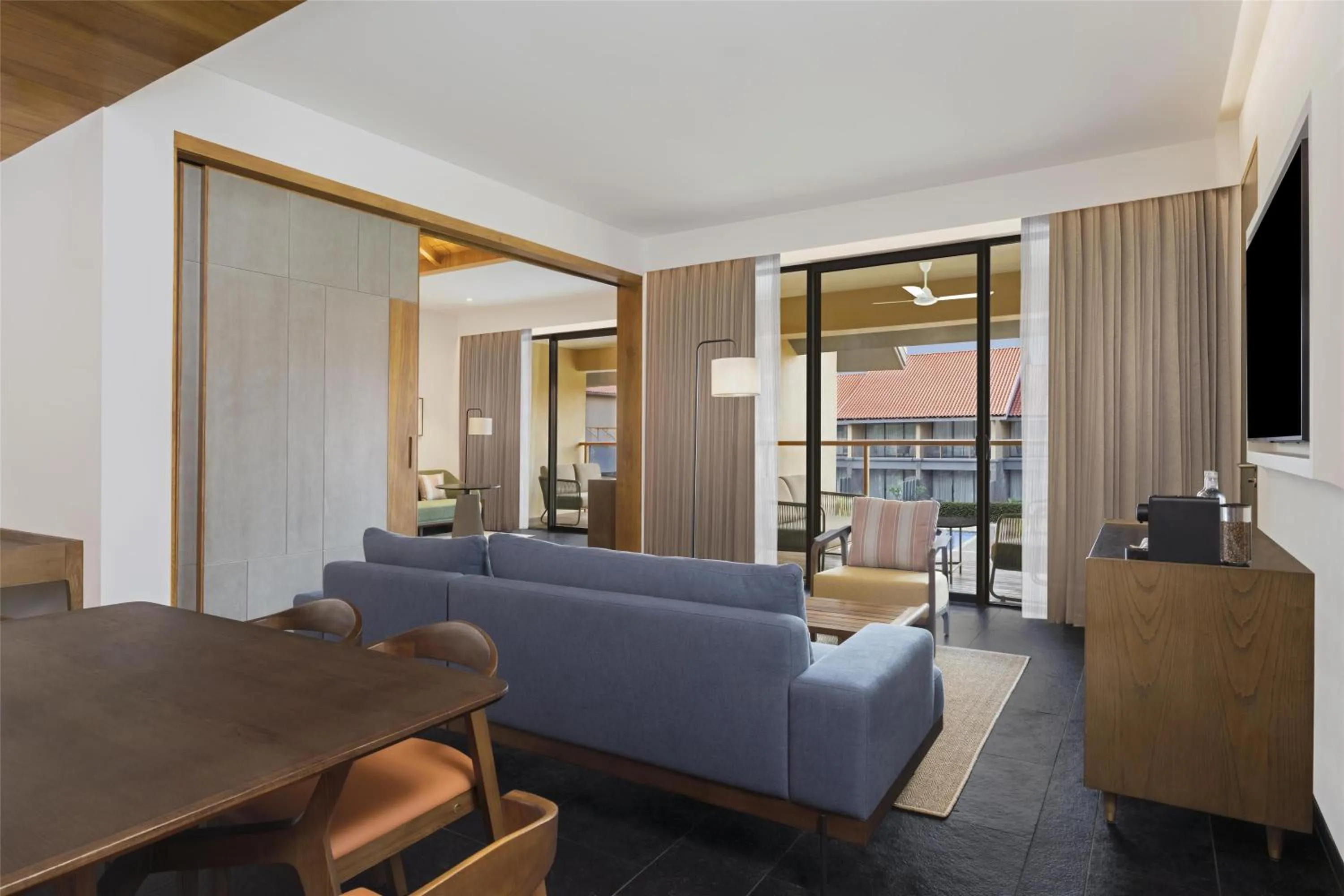 Living room in Hilton Hyderabad Genome Valley Resort & Spa