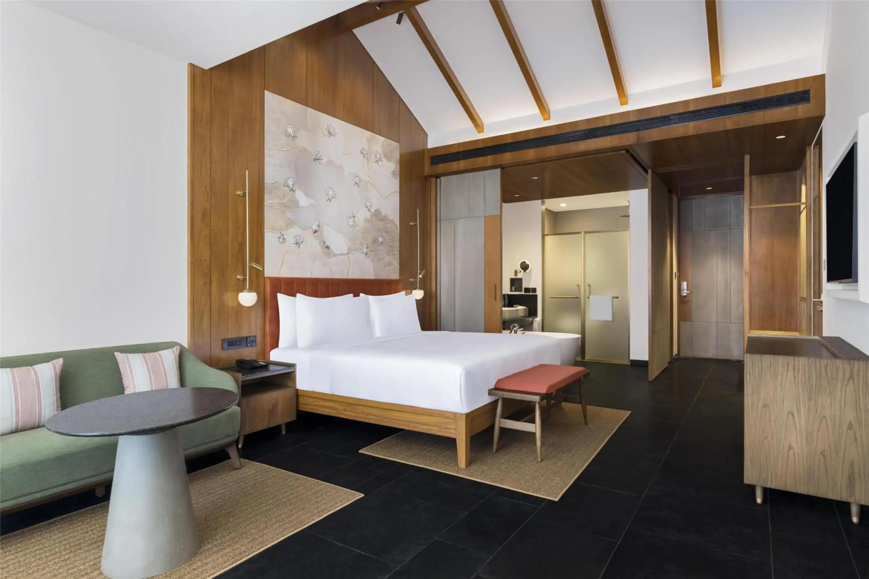 Deluxe King Room with Balcony and Garden View in Hilton Hyderabad Genome Valley Resort & Spa Deluxe King Room with Balcony and Garden View in Hilton Hyderabad Genome Valley Resort & Spa