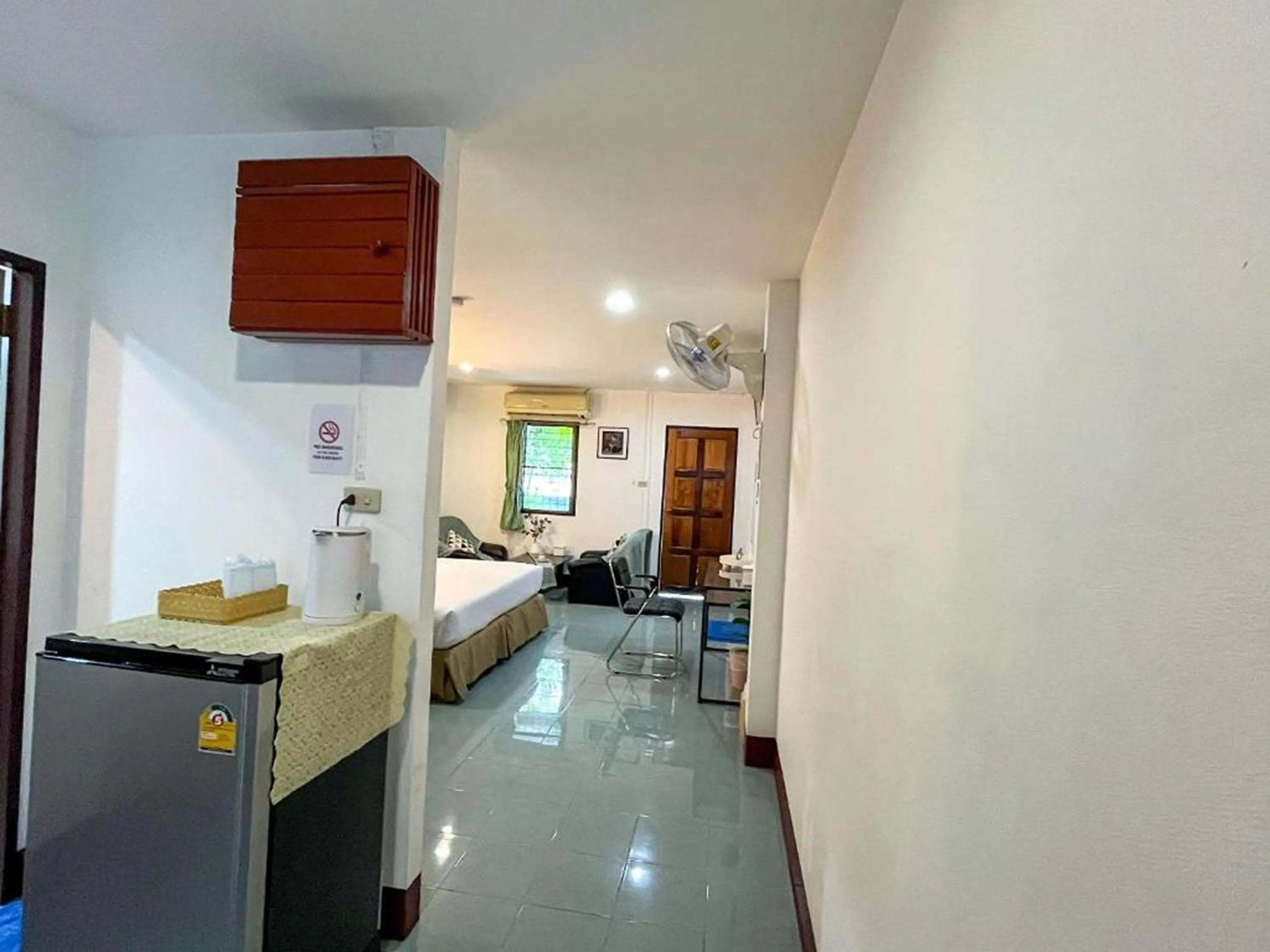 Kitchen or kitchenette, Bed in Rabbit Mansion Patong Hotel