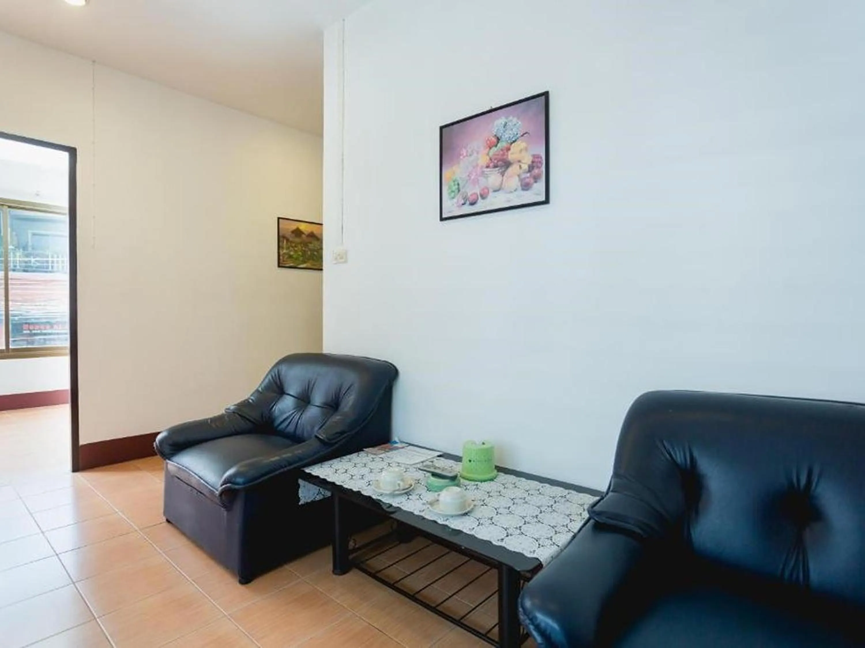 Living room in Rabbit Mansion Patong Hotel