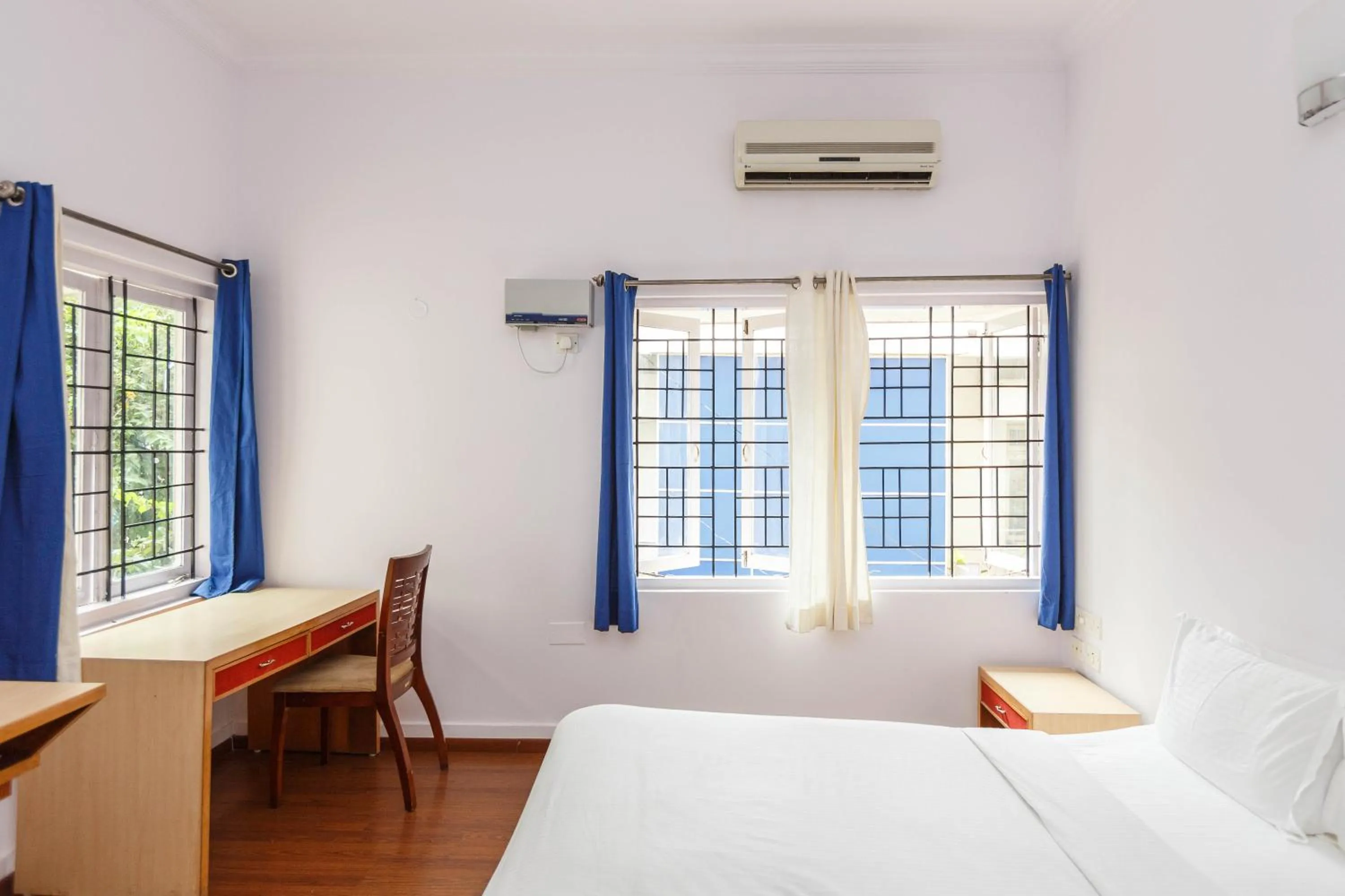 Bedroom, Bed in Locul Uptown - Near Bangalore Palace Grounds