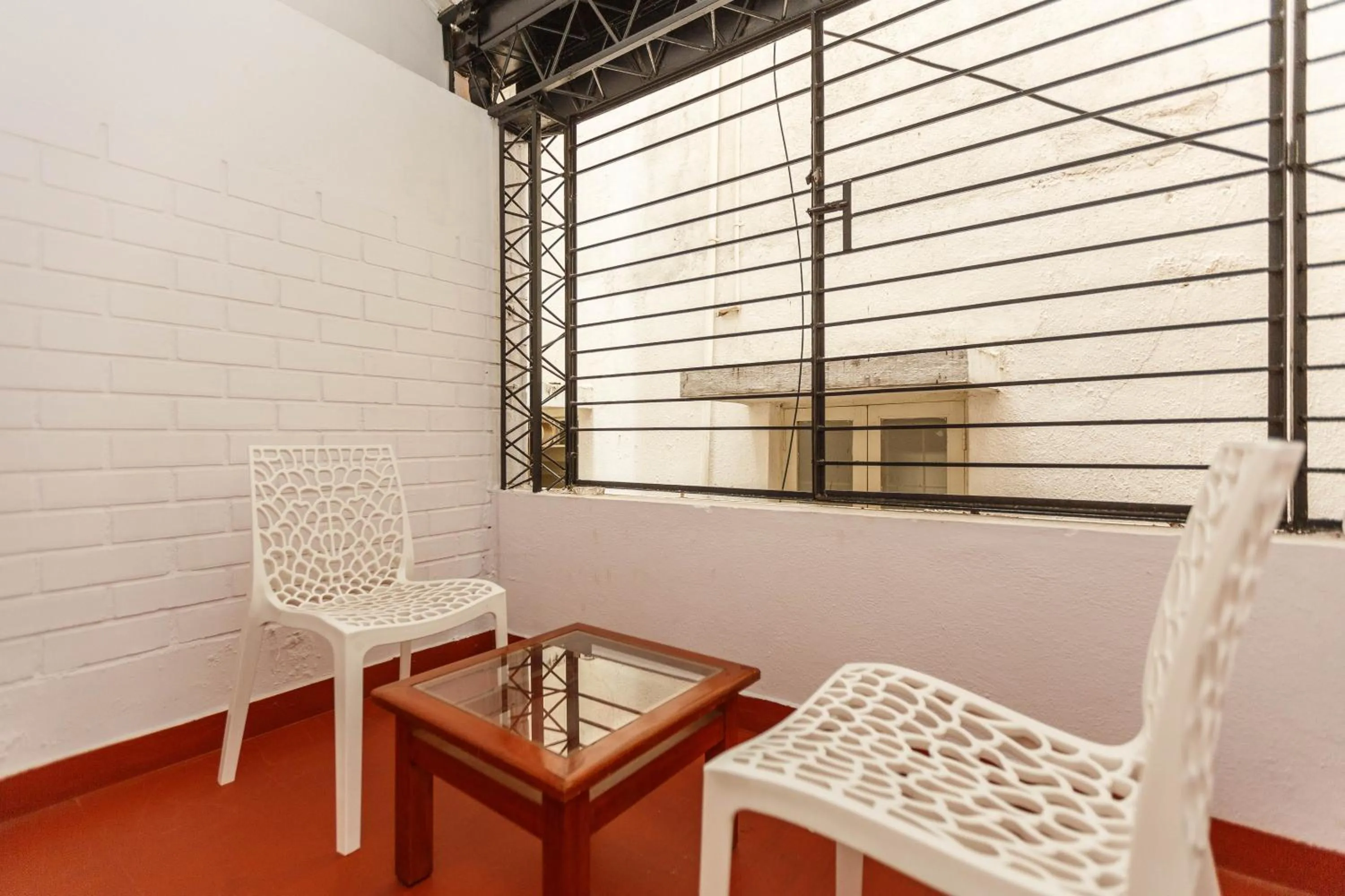 Seating area in Locul Uptown - Near Bangalore Palace Grounds