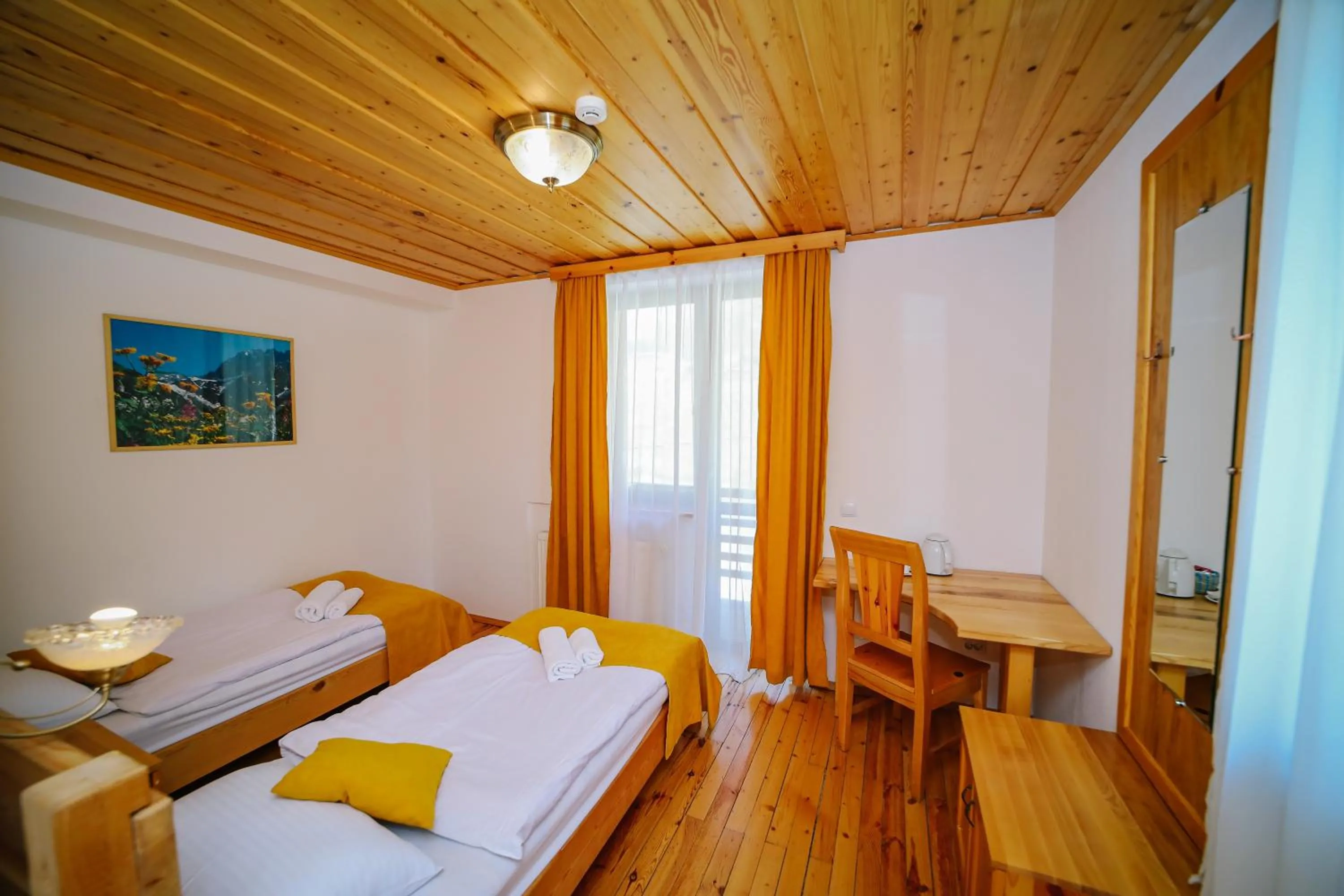Twin Room with Balcony in Alpenhaus Kazbegi Hotel & Restaurant