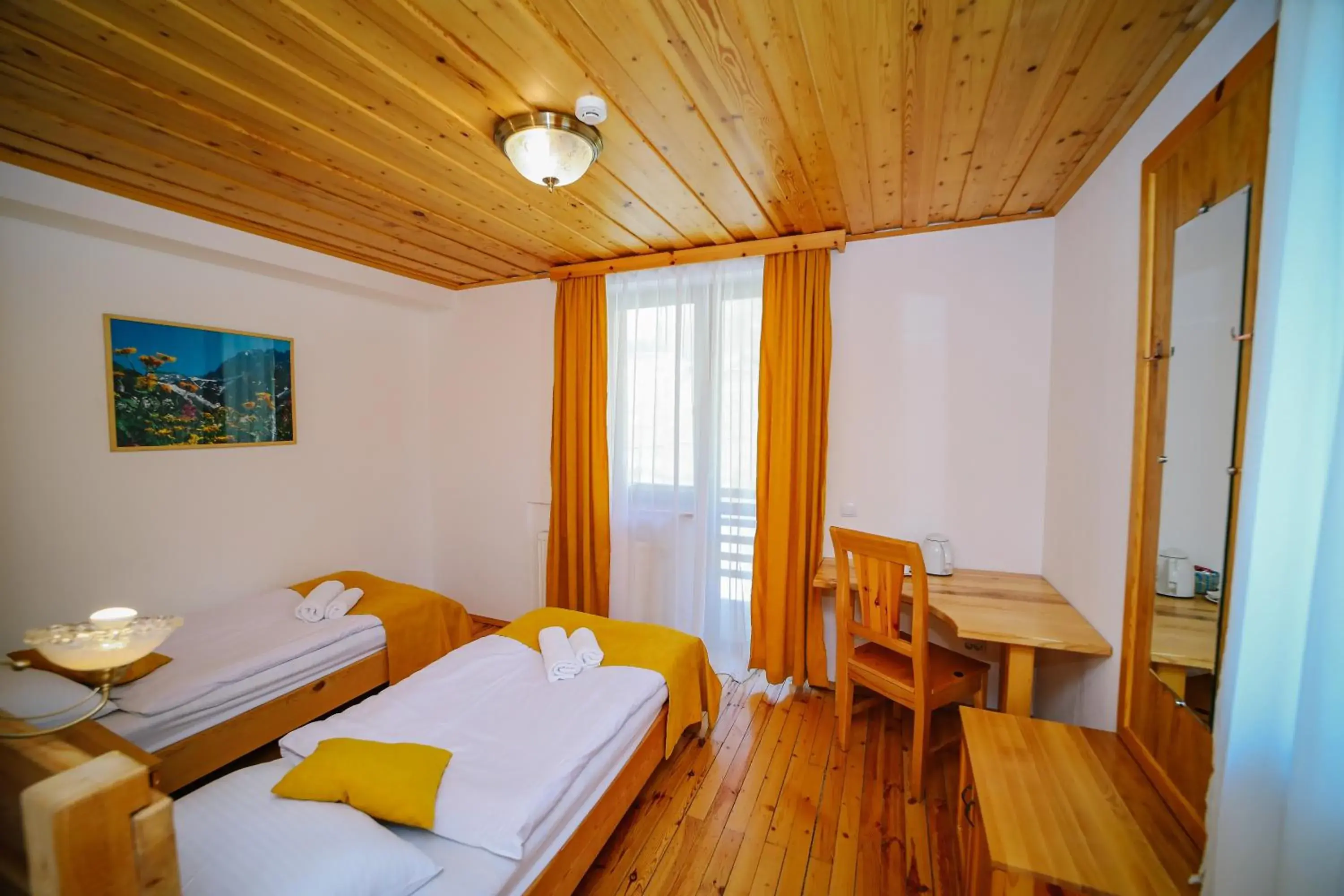 Twin Room with Balcony in Alpenhaus Kazbegi Hotel & Restaurant Twin Room with Balcony in Alpenhaus Kazbegi Hotel & Restaurant