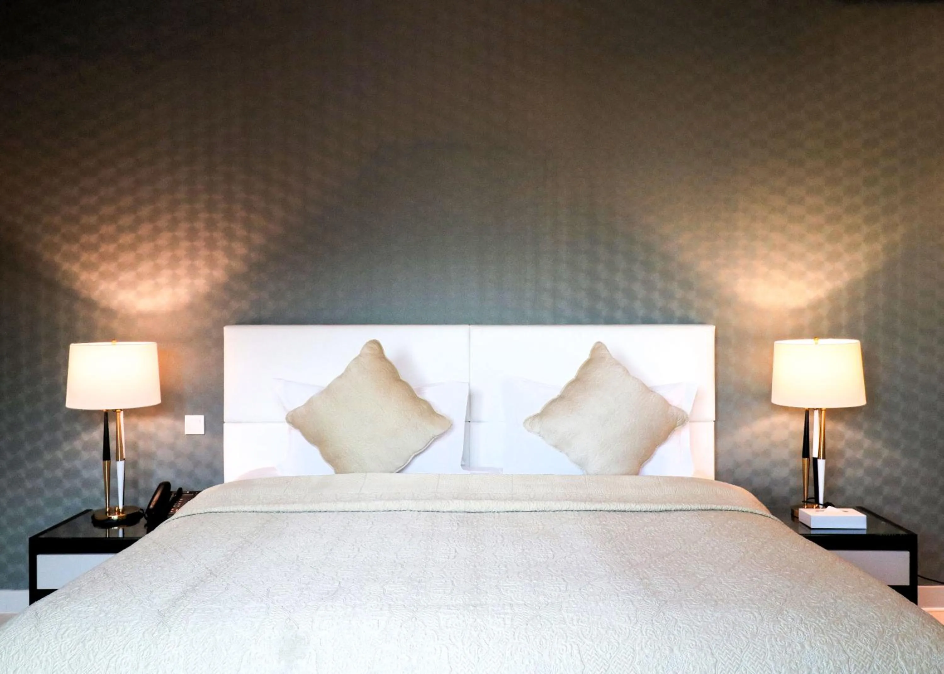 Bed in Lagoona Beach Luxury Resort and Spa