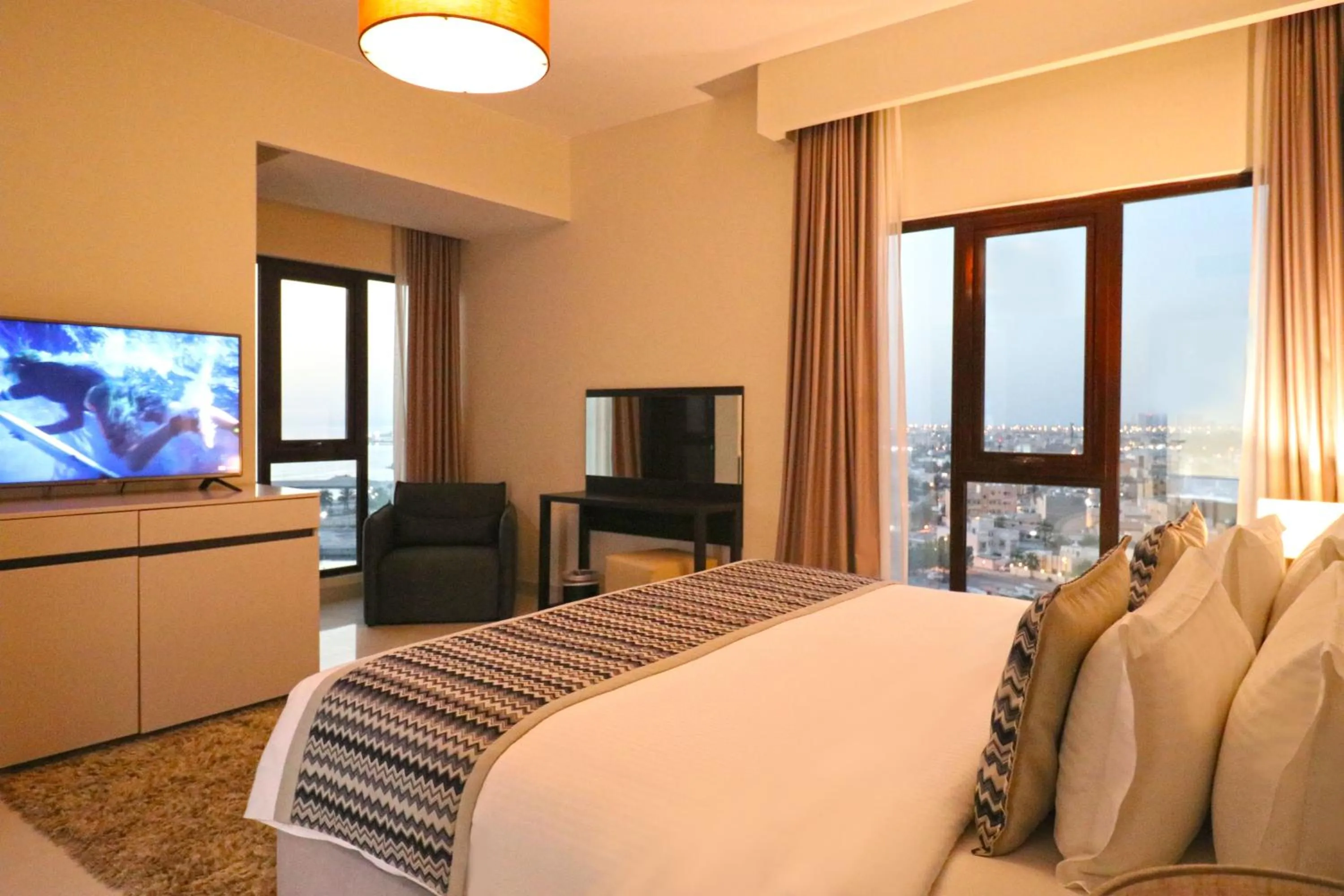 Bed in Lagoona Beach Luxury Resort and Spa