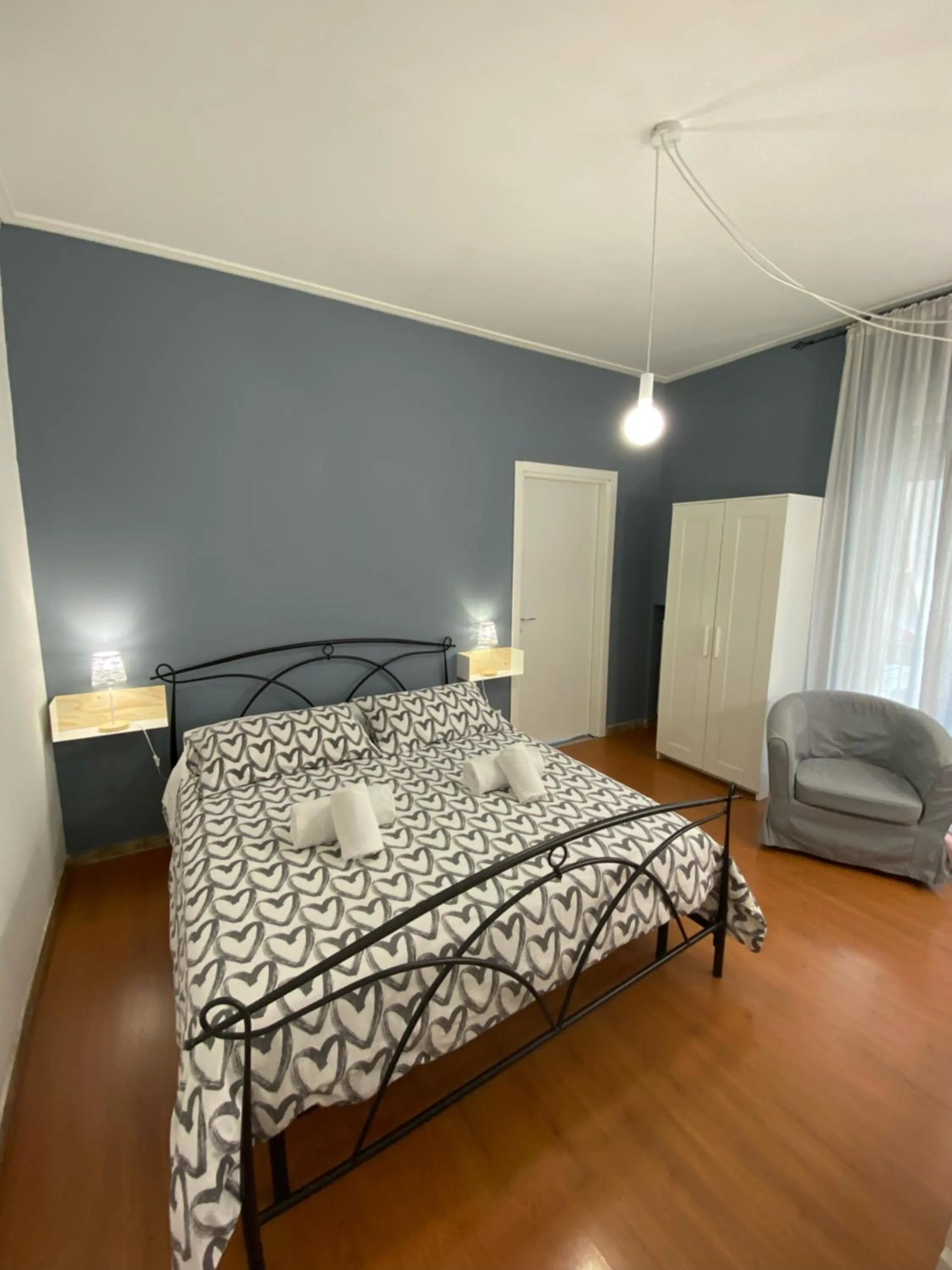 Bed in Delle Rose Rooms - Le Arche Verona