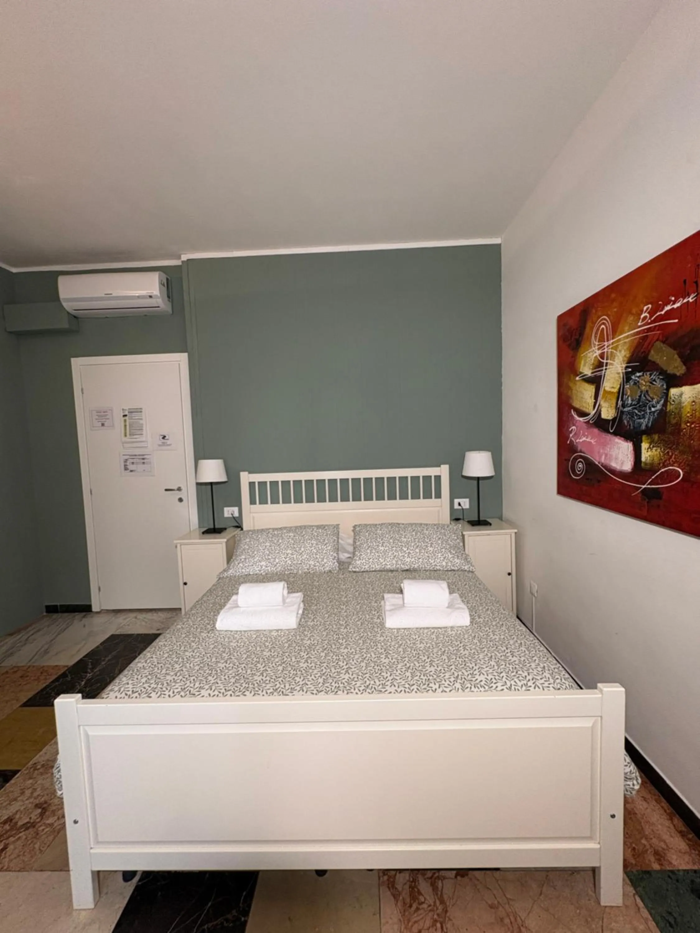 Bed in Delle Rose Rooms - Le Arche Verona