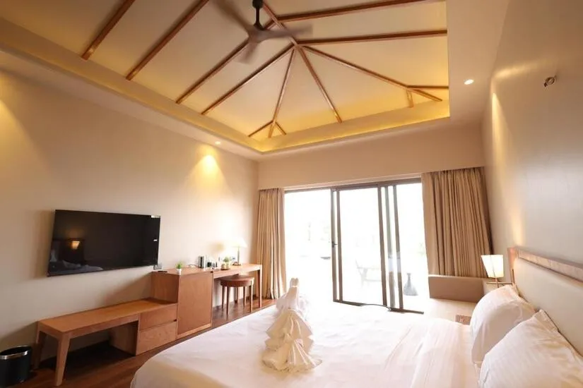 Bed in Ayati Resort & Spa