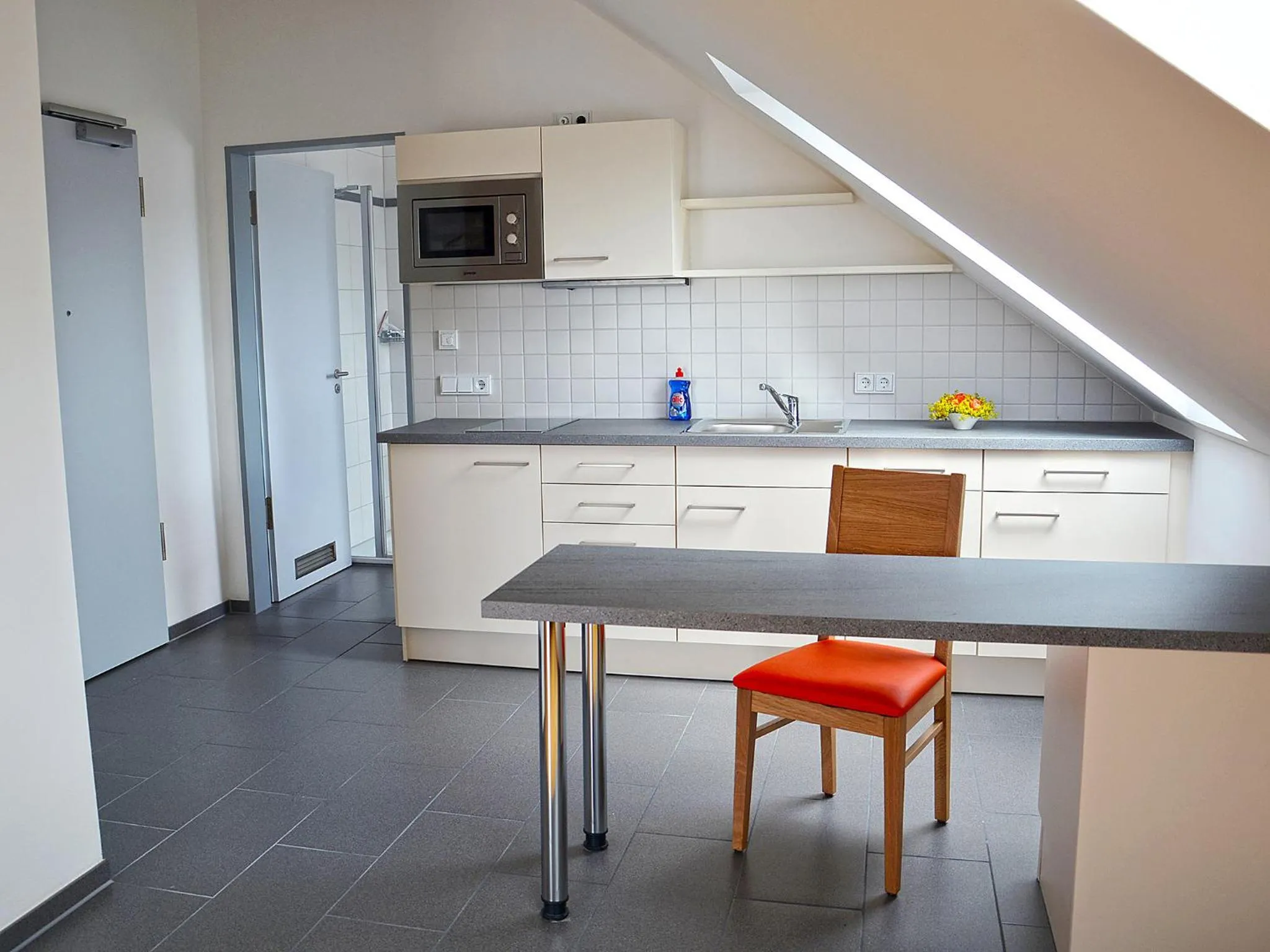 Kitchen or kitchenette in Apparthotel Ampertal