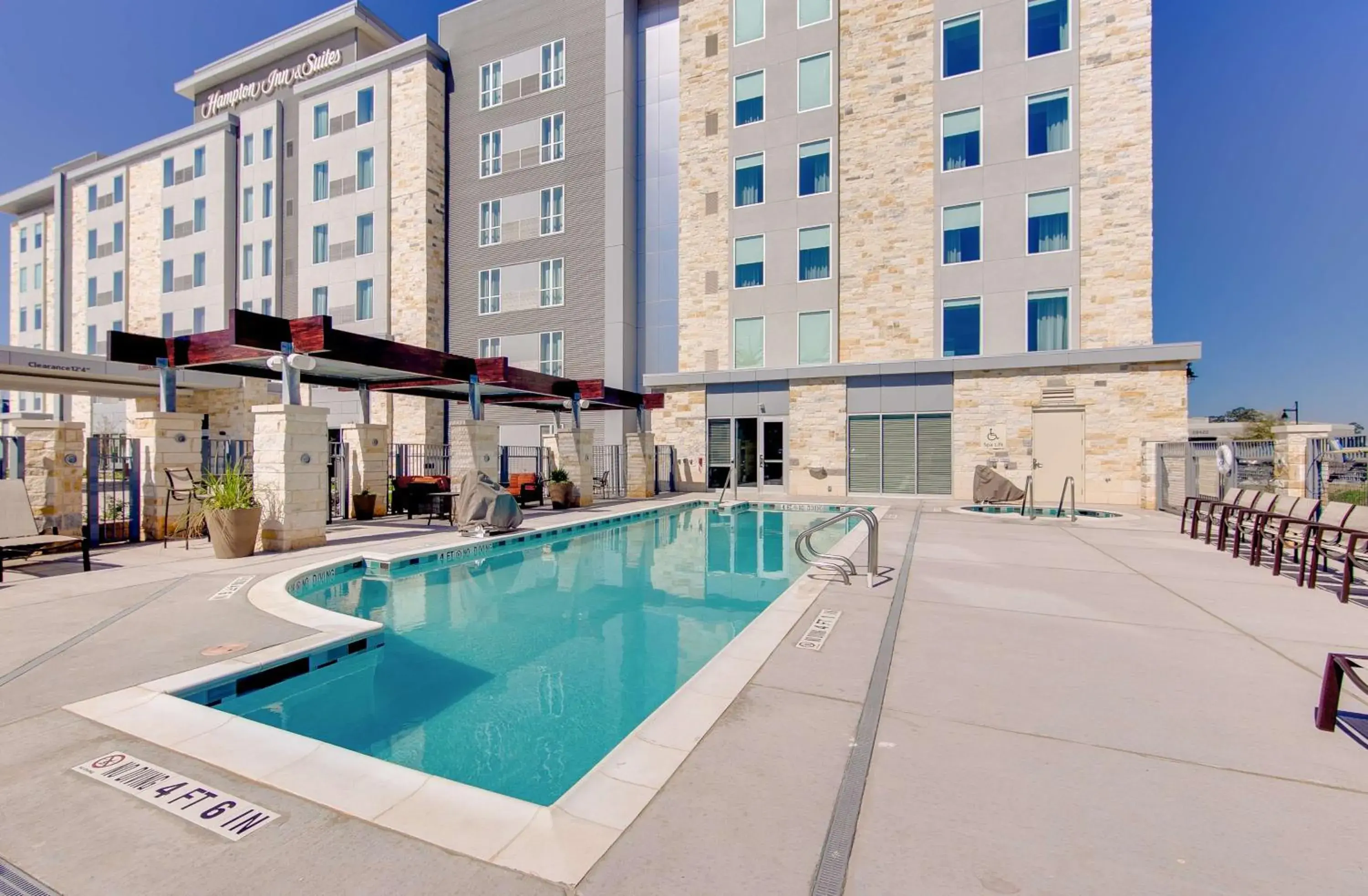 Pool view in Hampton Inn & Suites North Houston Spring Pool view in Hampton Inn & Suites North Houston Spring