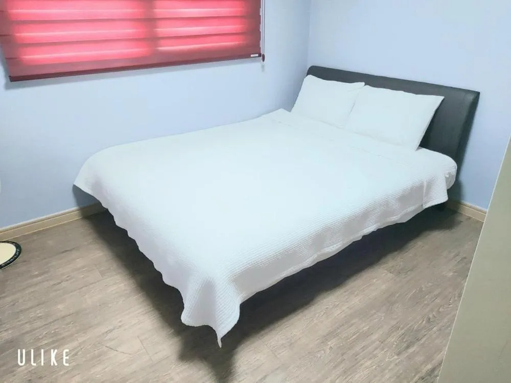 Bed in Jeju Olle House