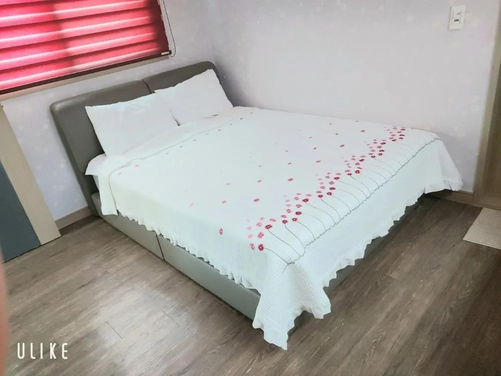 Bed in Jeju Olle House