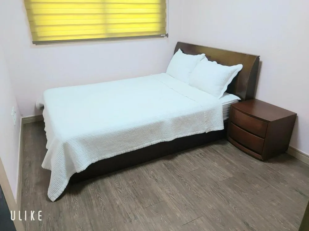 Bed in Jeju Olle House