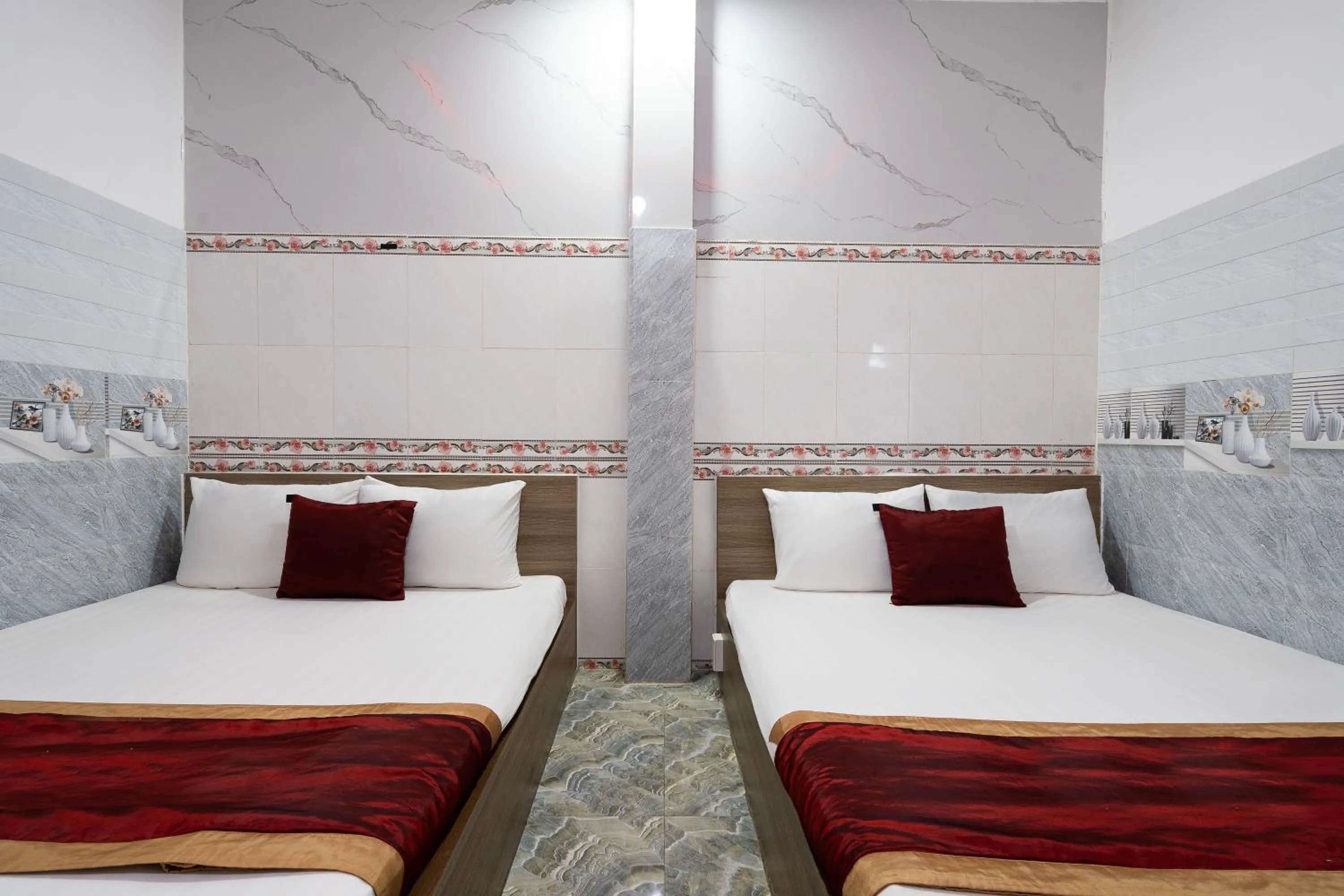 Photo of the whole room, Bed in Collection O District 12 - Mau Tim Hotel