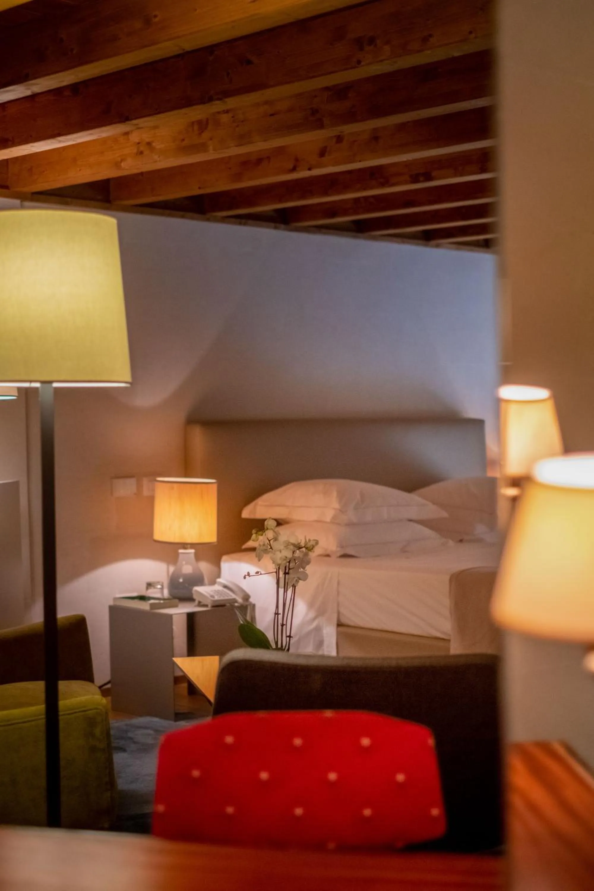 Bed in La Fiermontina Luxury Home Hotel