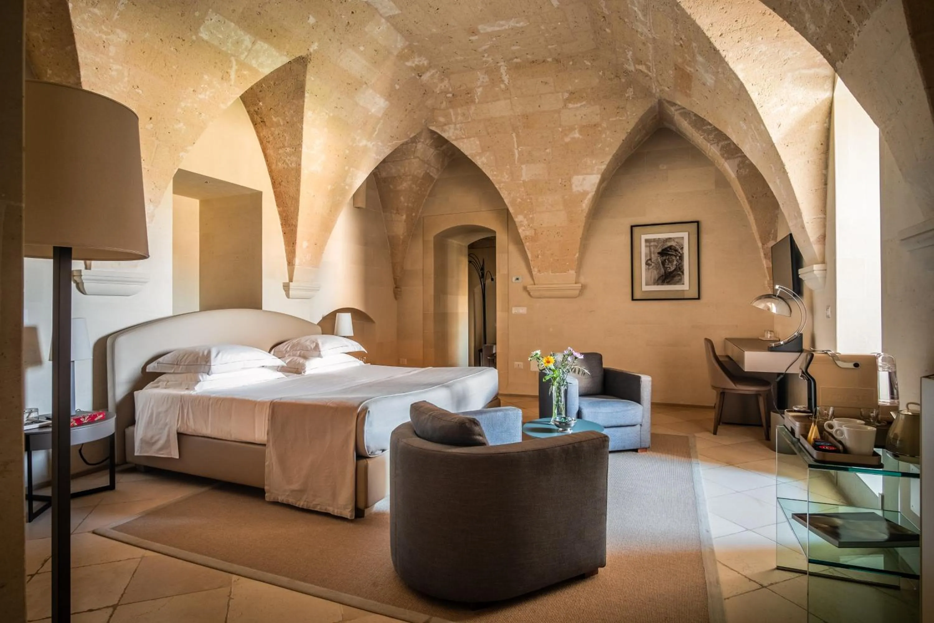 Bed in La Fiermontina Luxury Home Hotel