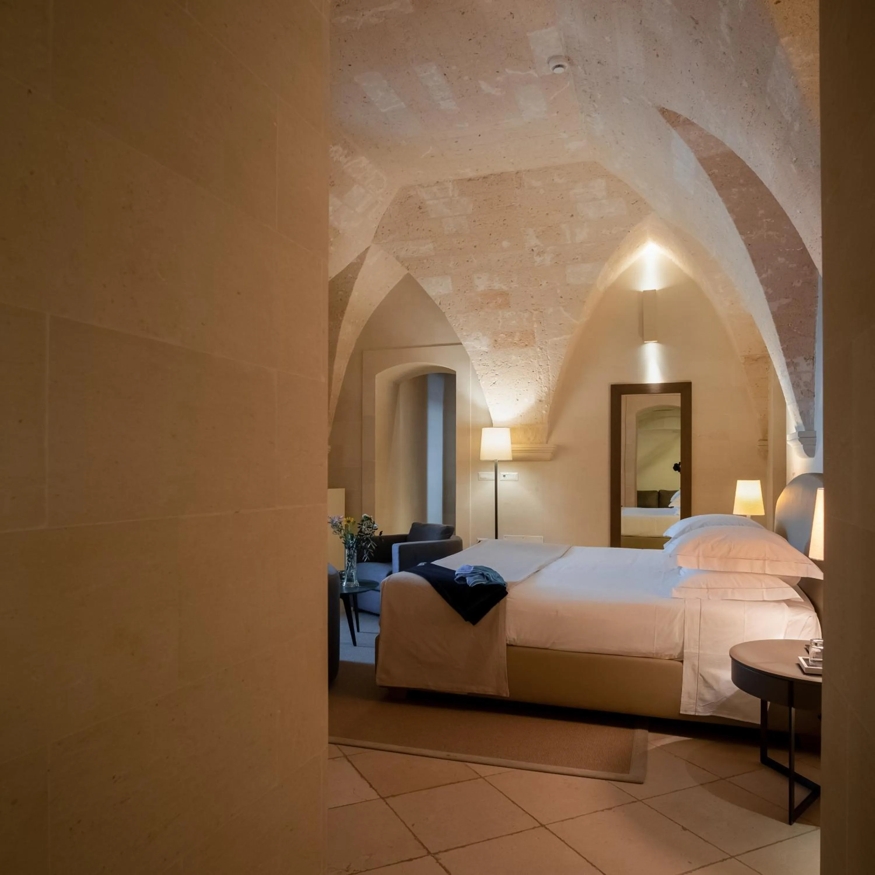 Bed in La Fiermontina Luxury Home Hotel
